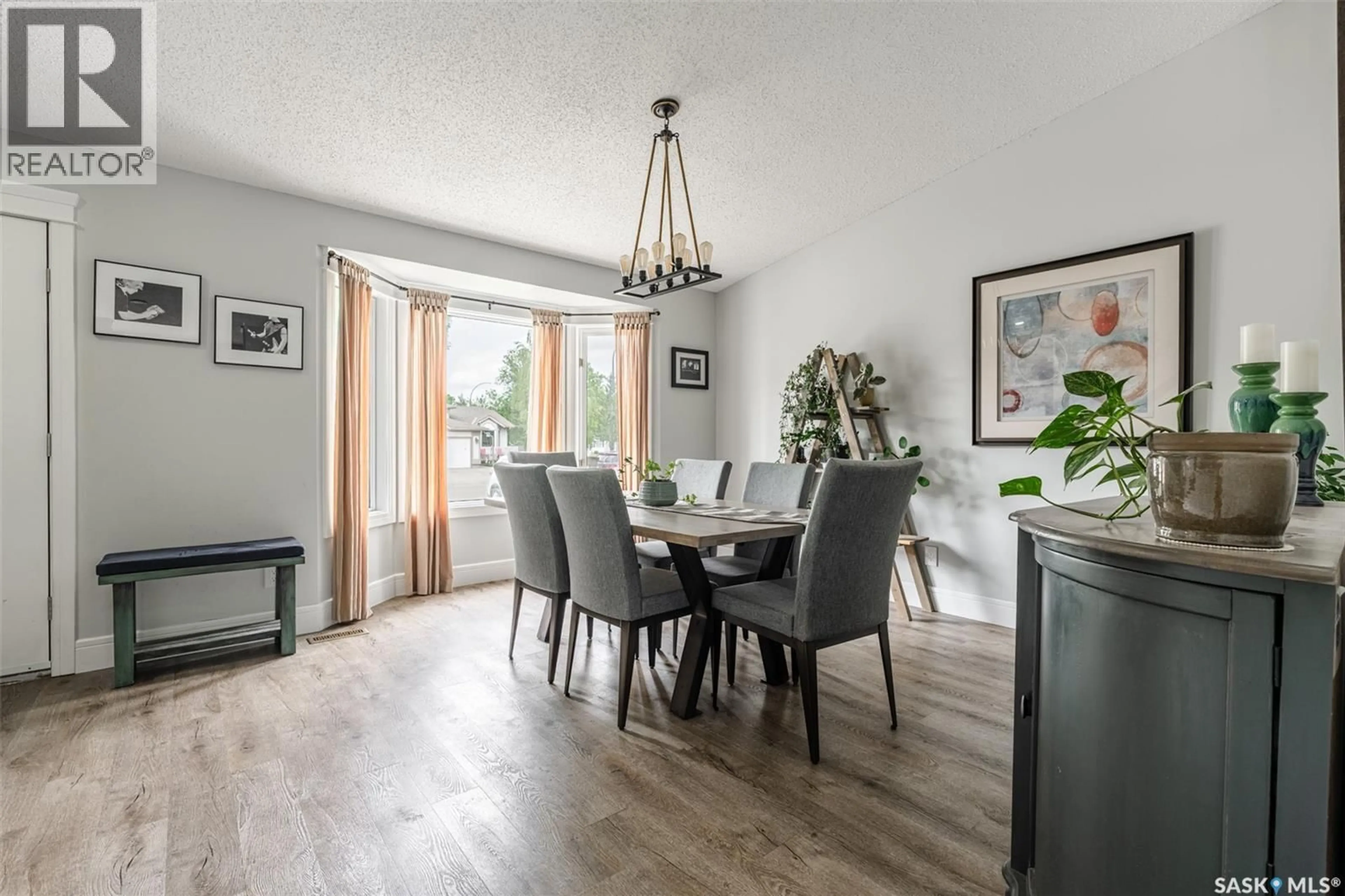 Dining room, wood/laminate floor for 759 COWLEY ROAD, Saskatoon Saskatchewan S7N4J1