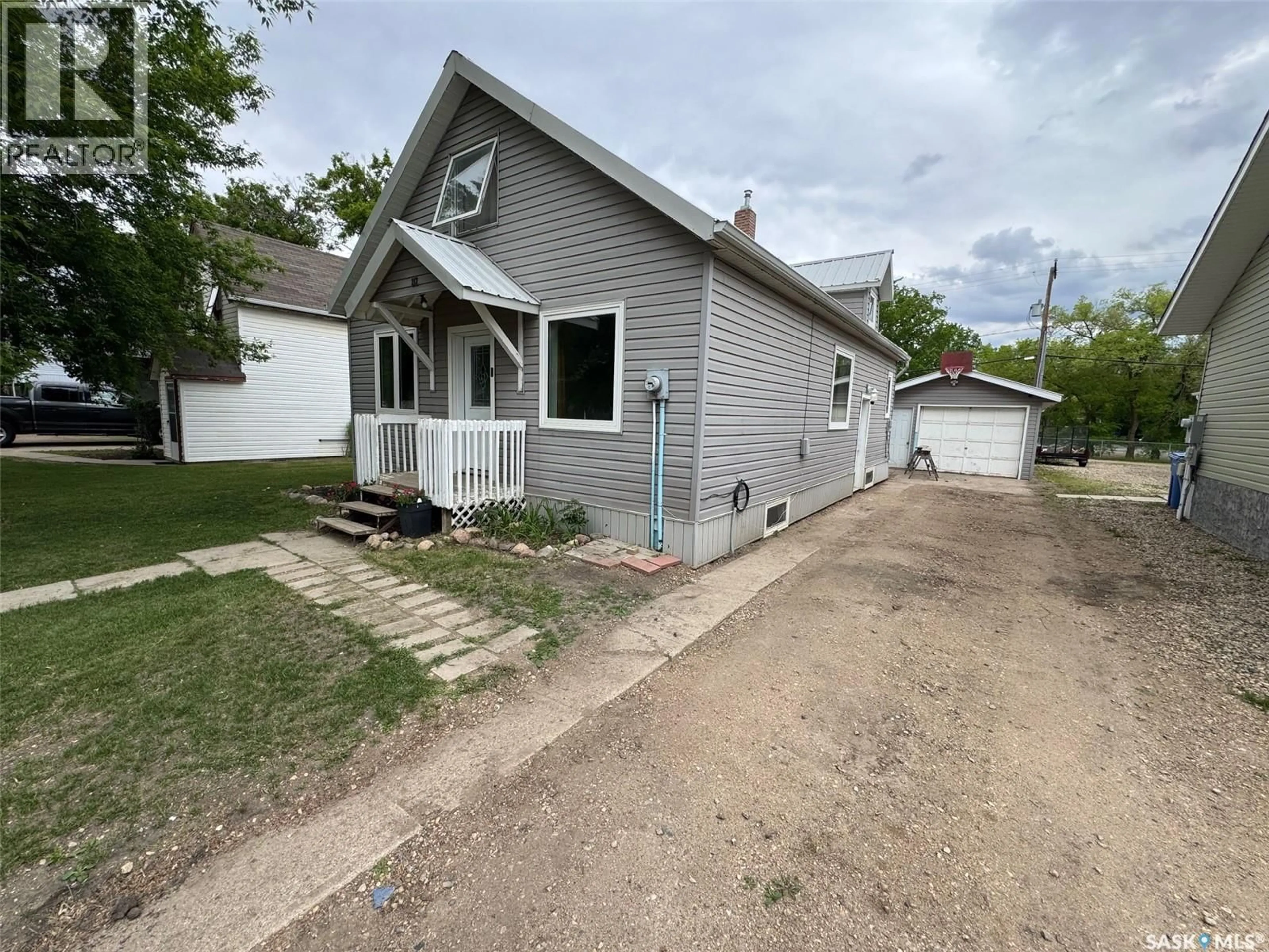 A pic from outside/outdoor area/front of a property/back of a property/a pic from drone, street for 212 CRAWFORD AVENUE, Melfort Saskatchewan S0E1A0