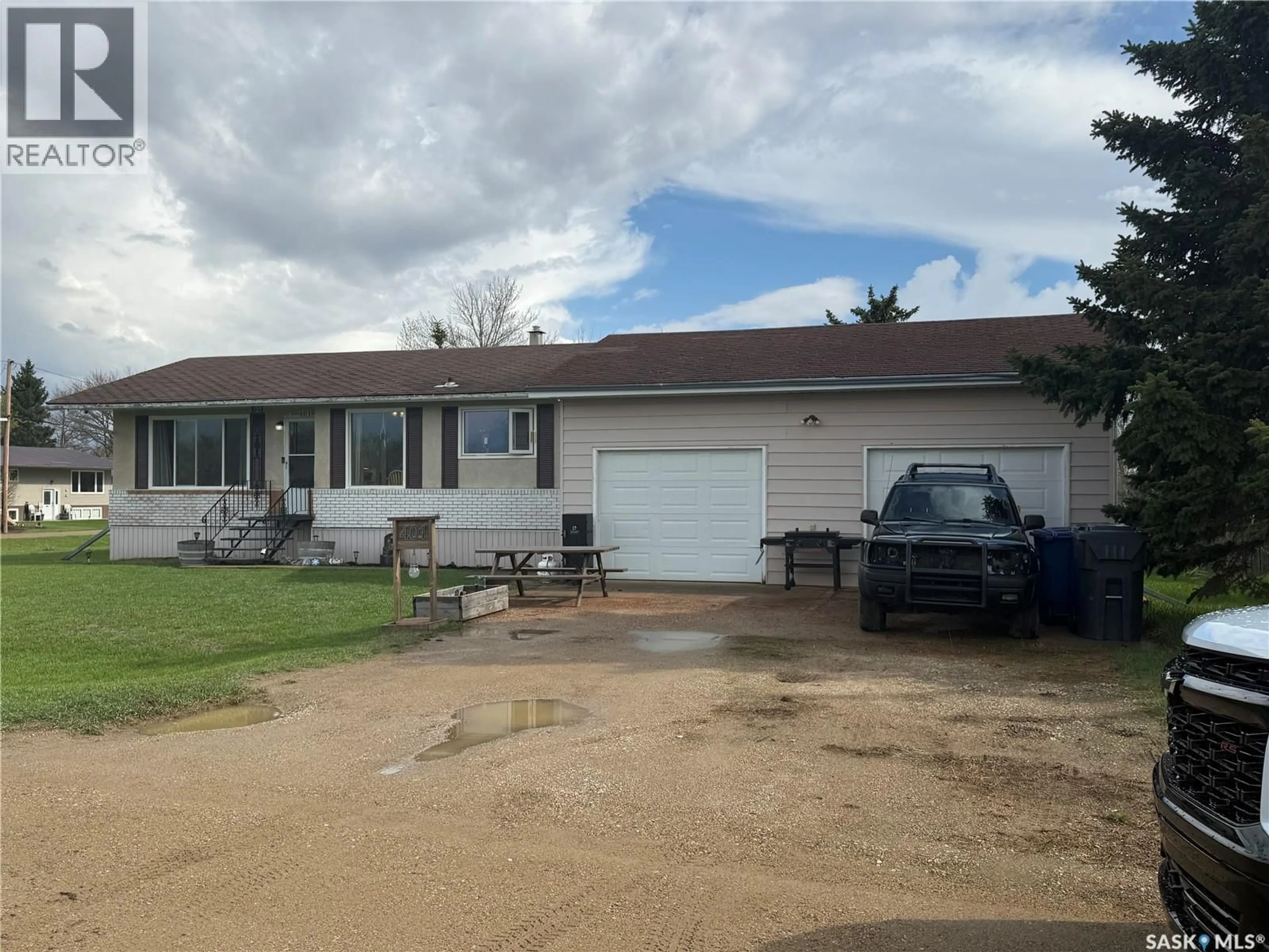 A pic from outside/outdoor area/front of a property/back of a property/a pic from drone, street for 401 GOLSPIE STREET, Craik Saskatchewan S0G0V0