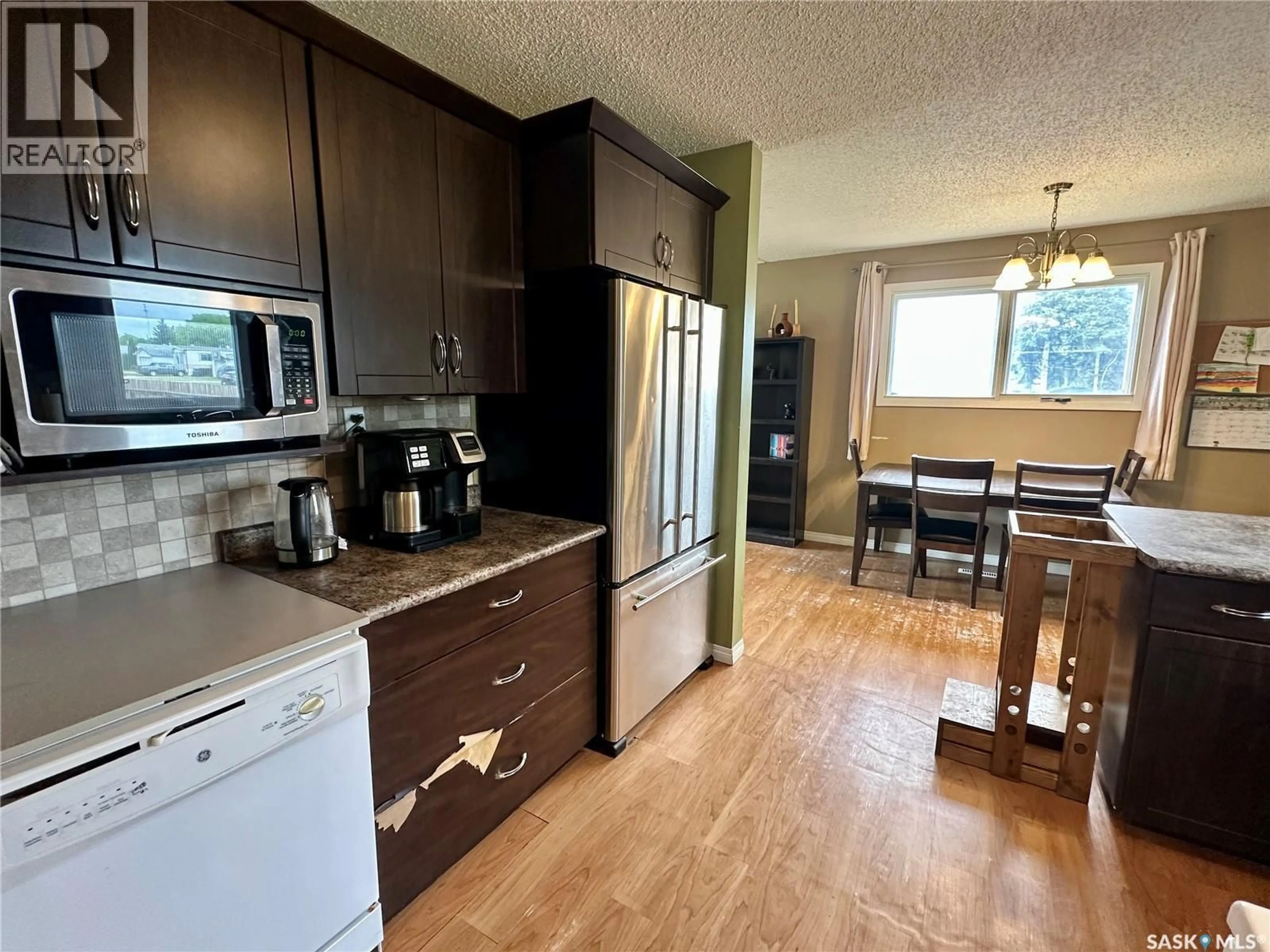 Open concept kitchen, unknown for 100 1ST STREET, Warman Saskatchewan S0K4S0