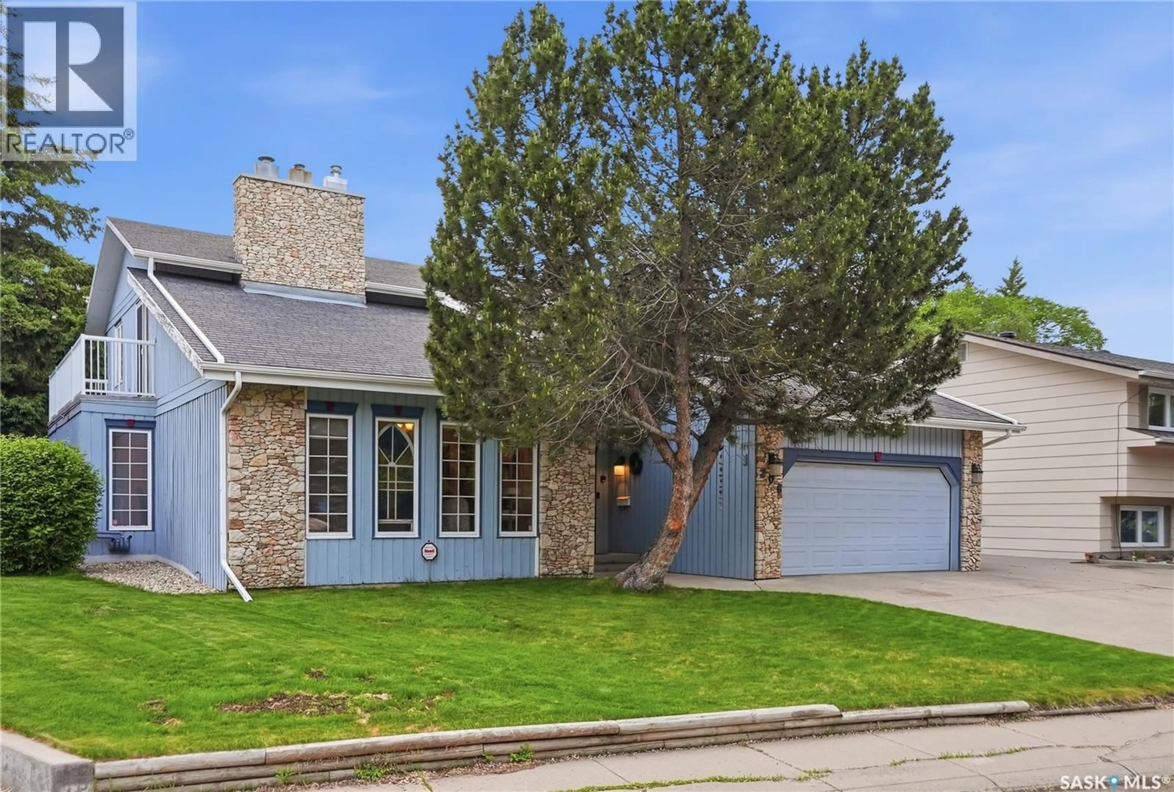 Home with brick exterior material, street for 206 WILLOUGHBY CRESCENT, Saskatoon Saskatchewan S7H4W7