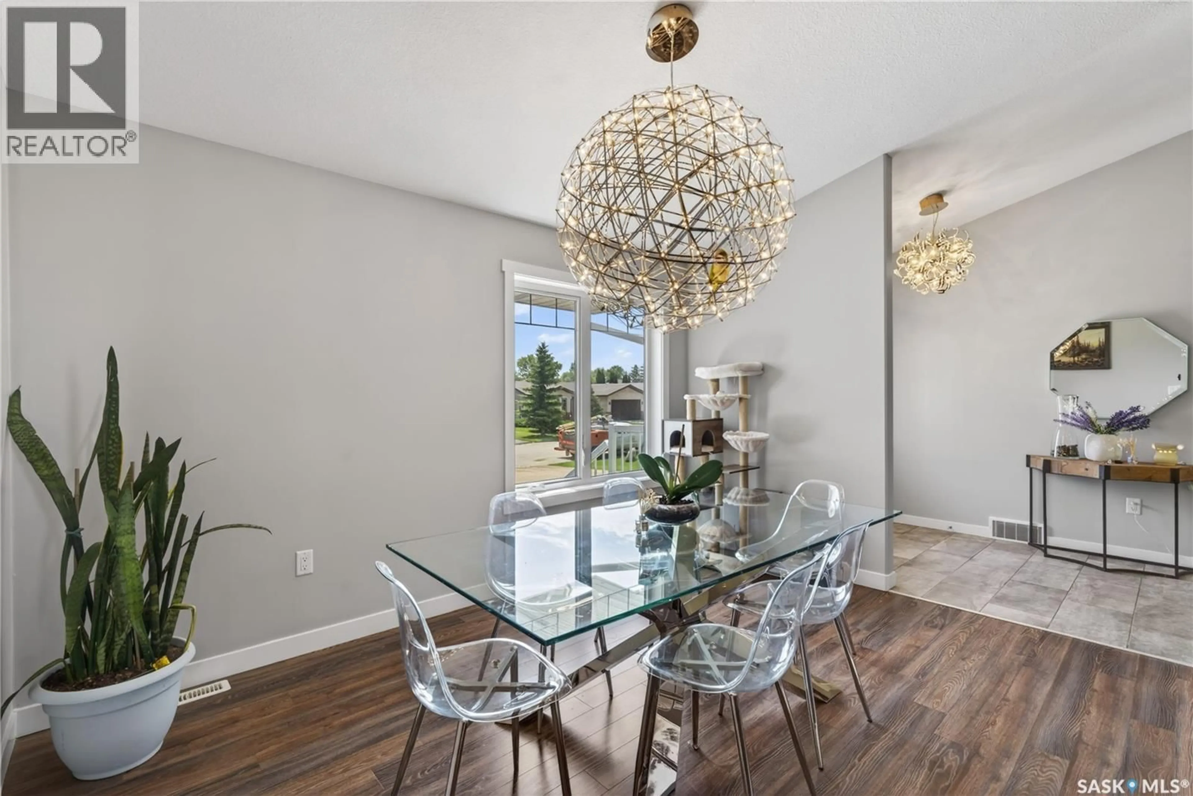 Dining room, wood/laminate floor for 715 GOLBURN CRESCENT, Tisdale Saskatchewan S0E1T0