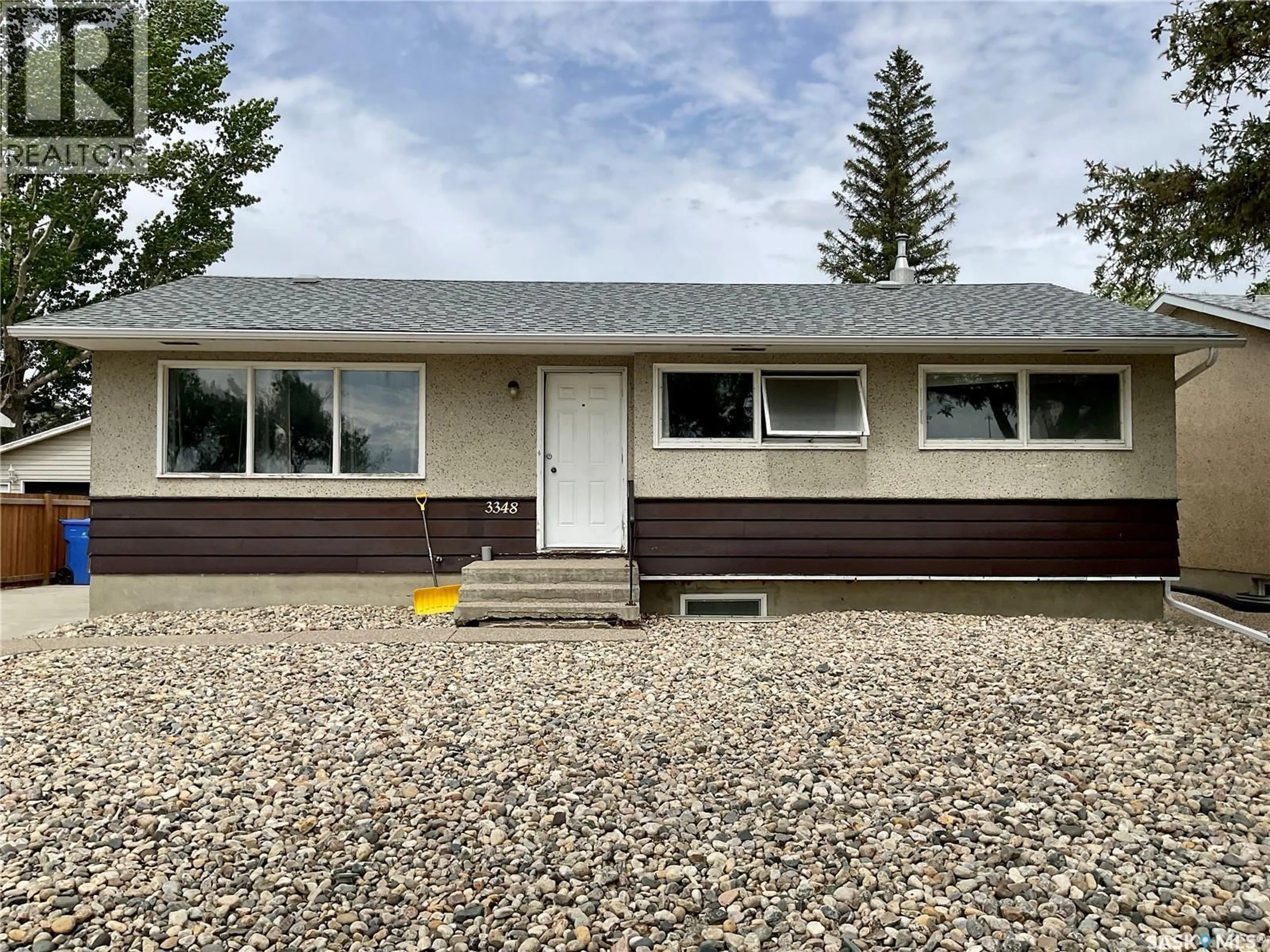 Home with vinyl exterior material, street for 3348 GRANT ROAD, Regina Saskatchewan S4S5H5