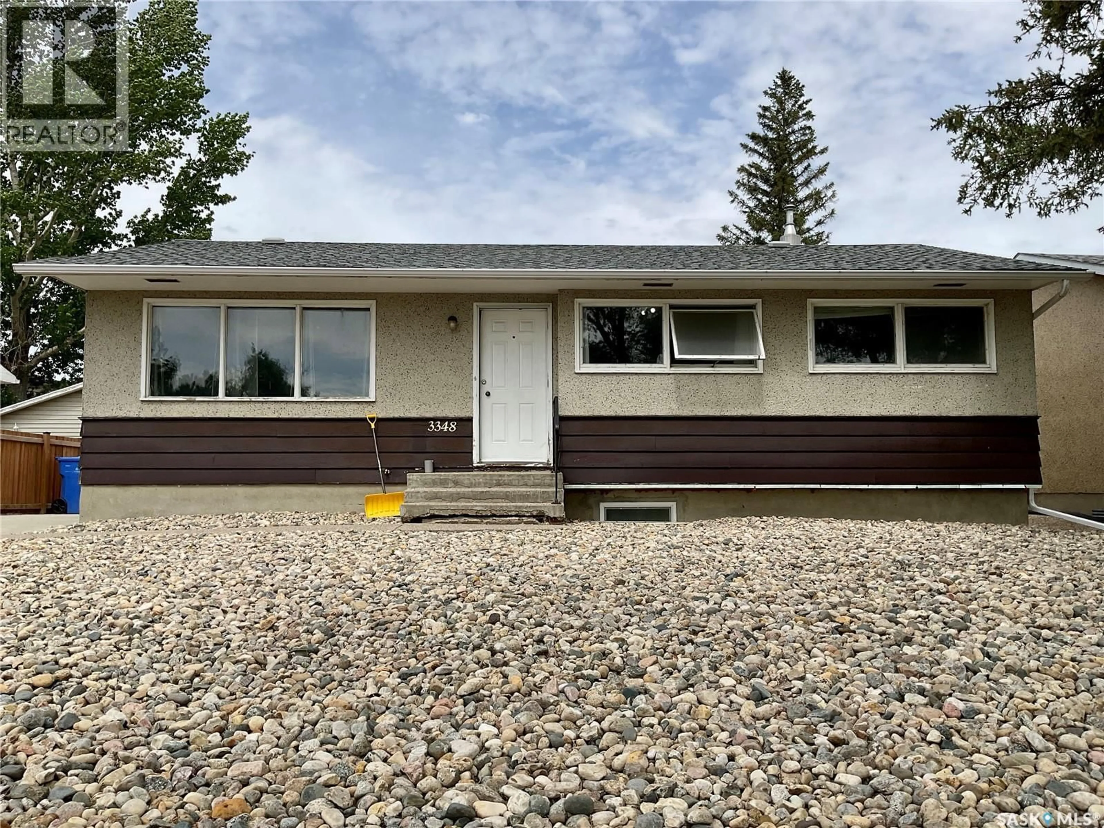 Home with vinyl exterior material, street for 3348 GRANT ROAD, Regina Saskatchewan S4S5H5