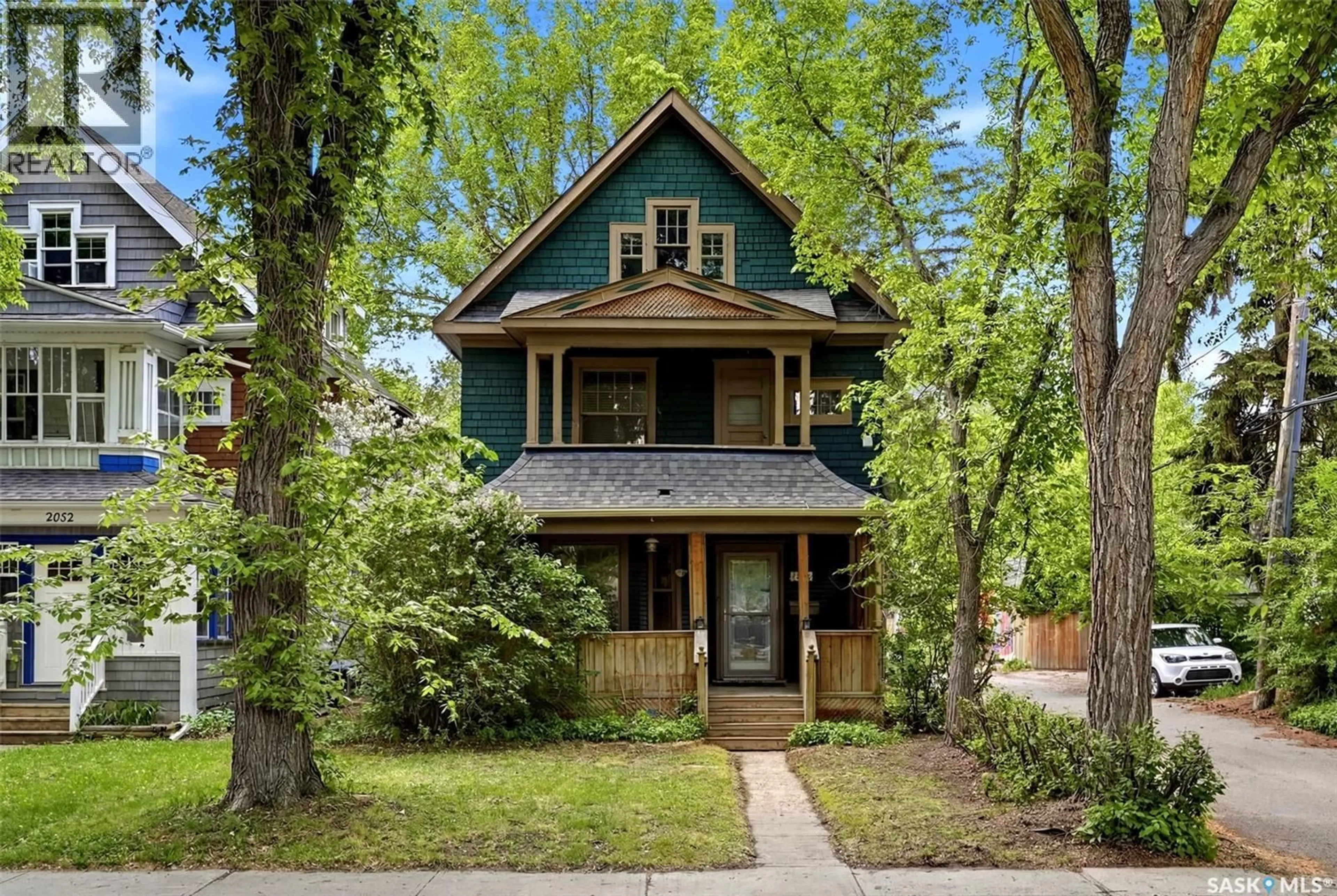 Home with brick exterior material, street for 2026 GARNET STREET, Regina Saskatchewan S4T2Z6