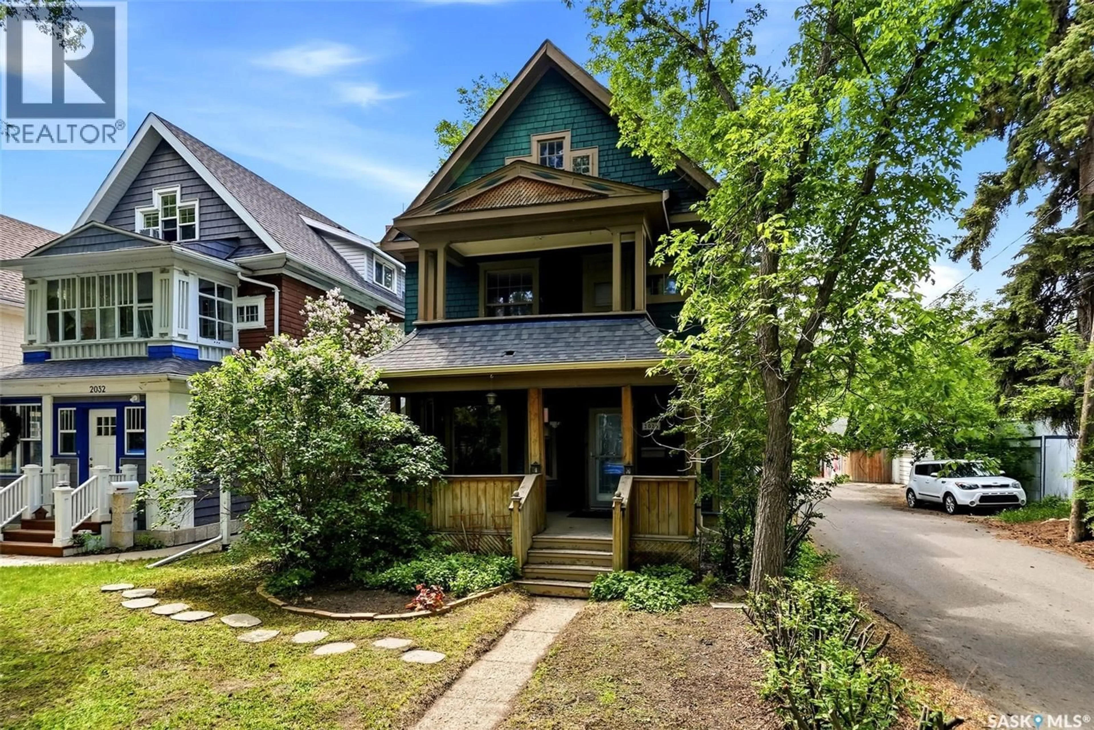Home with brick exterior material, street for 2026 GARNET STREET, Regina Saskatchewan S4T2Z6