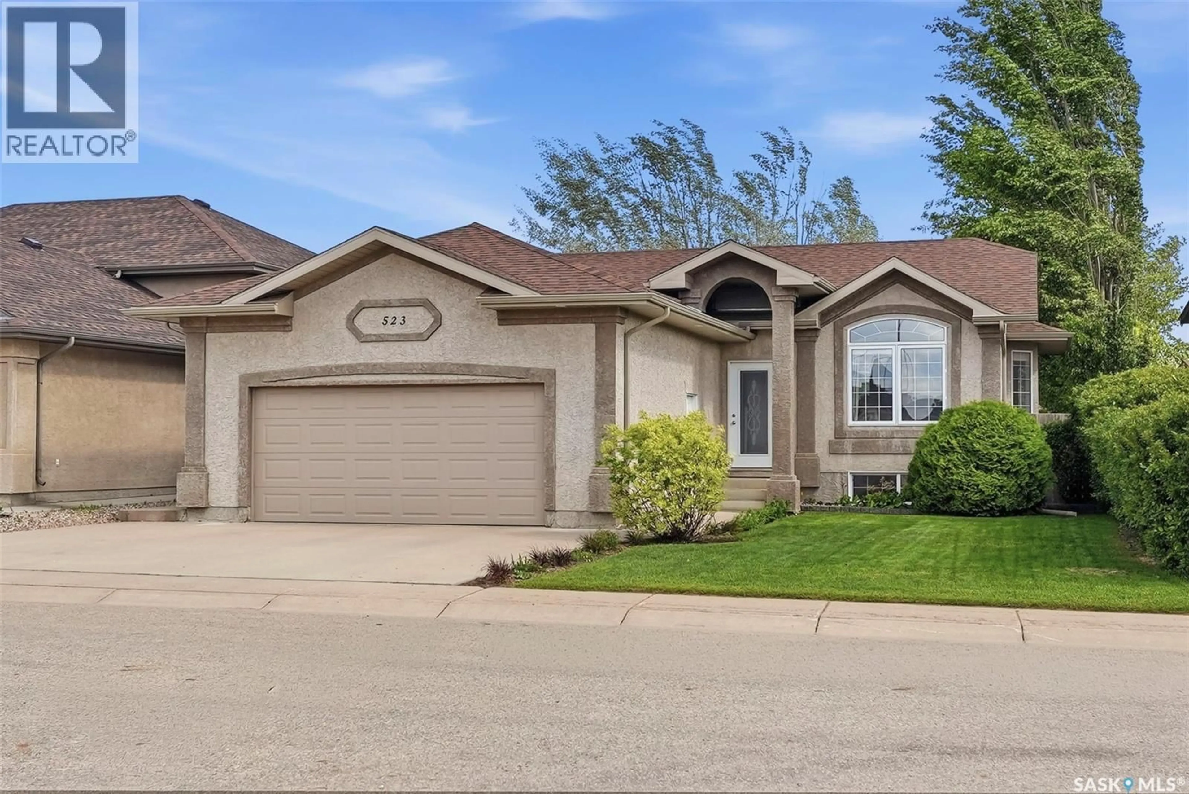 Home with vinyl exterior material, street for 523 ENS LANE, Warman Saskatchewan S0K4S0
