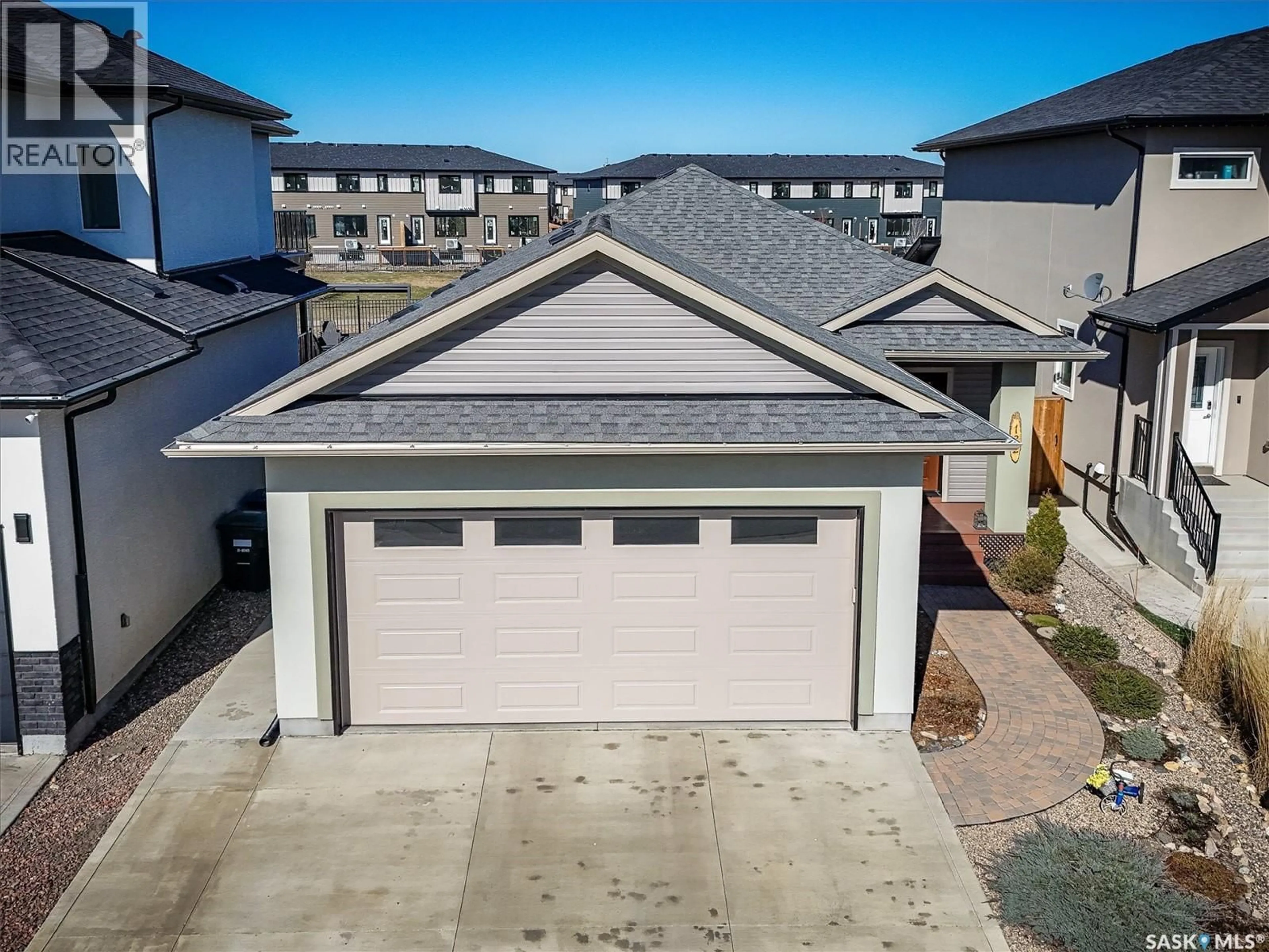 A pic from outside/outdoor area/front of a property/back of a property/a pic from drone, street for 132 FORSEY AVENUE, Saskatoon Saskatchewan S7W0Z6