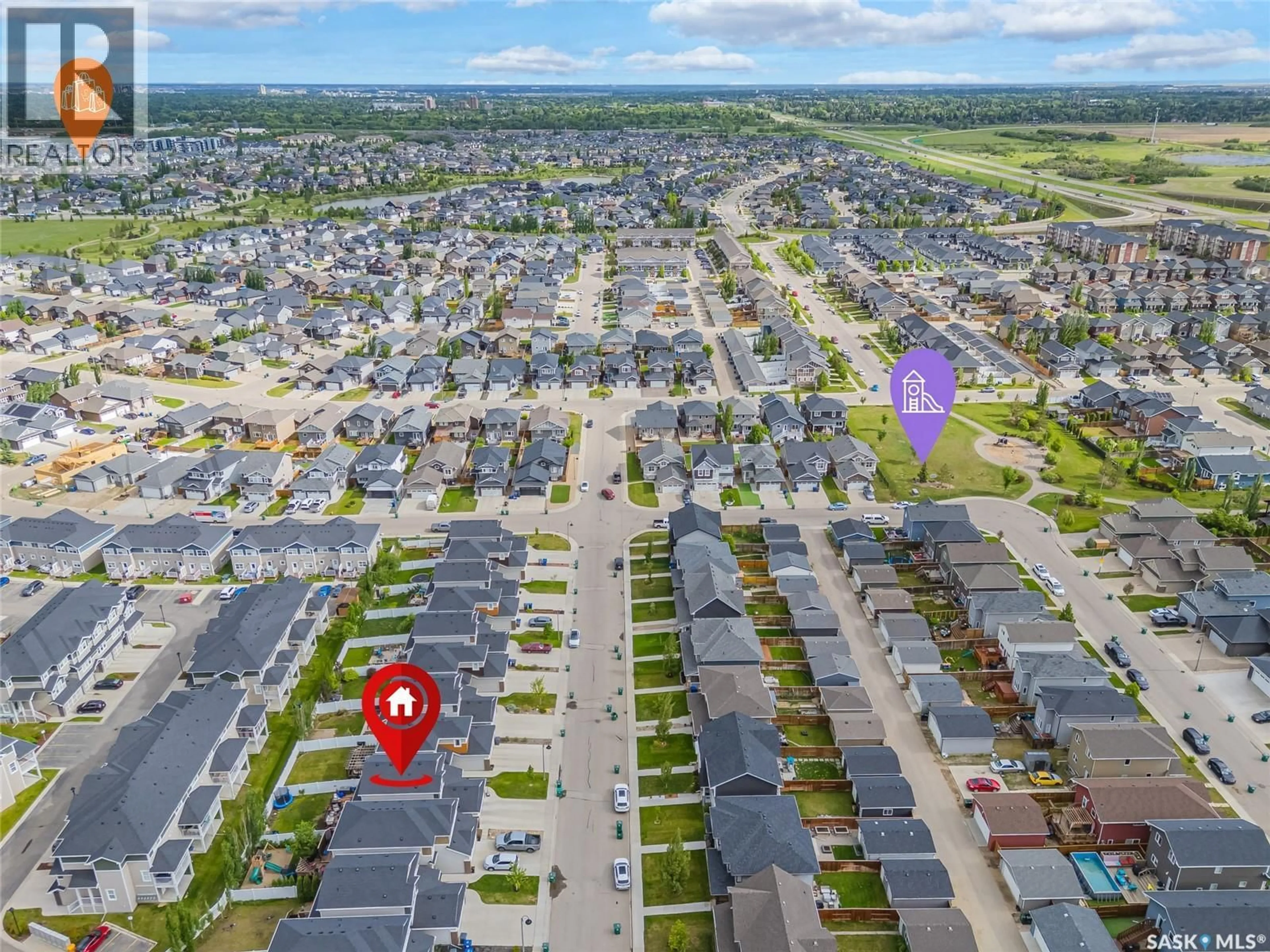 A pic from outside/outdoor area/front of a property/back of a property/a pic from drone, street for 1057 KOLYNCHUK CRESCENT, Saskatoon Saskatchewan S7T0X4