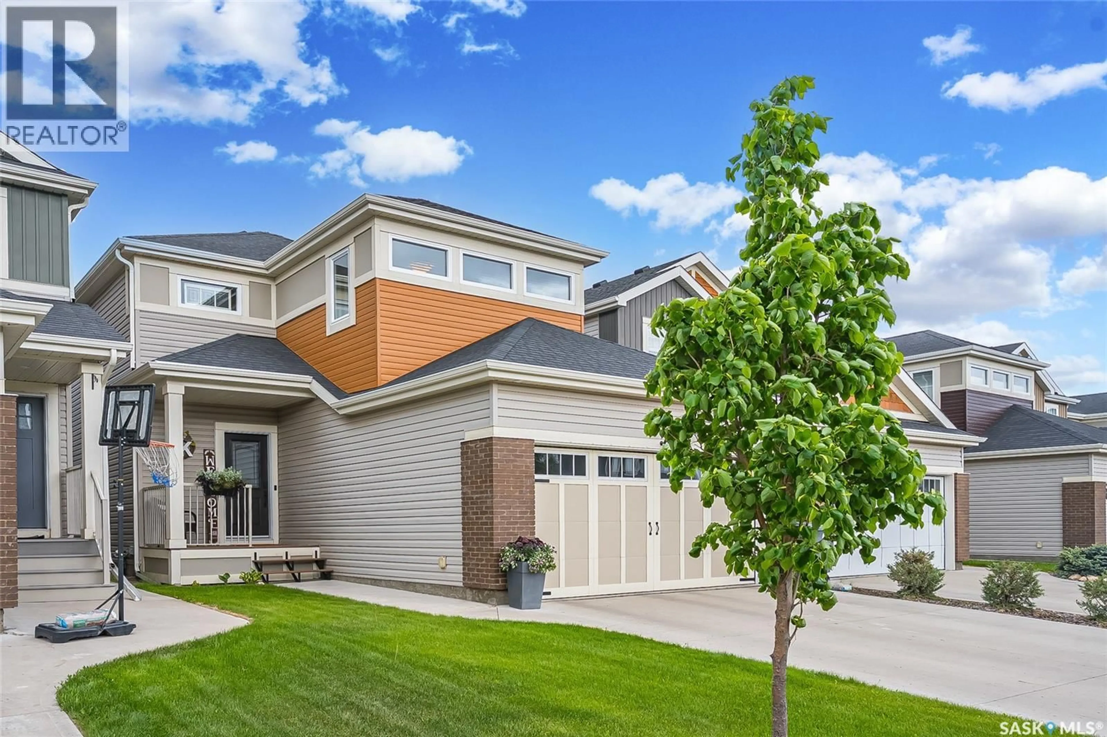 Home with vinyl exterior material, street for 1057 KOLYNCHUK CRESCENT, Saskatoon Saskatchewan S7T0X4