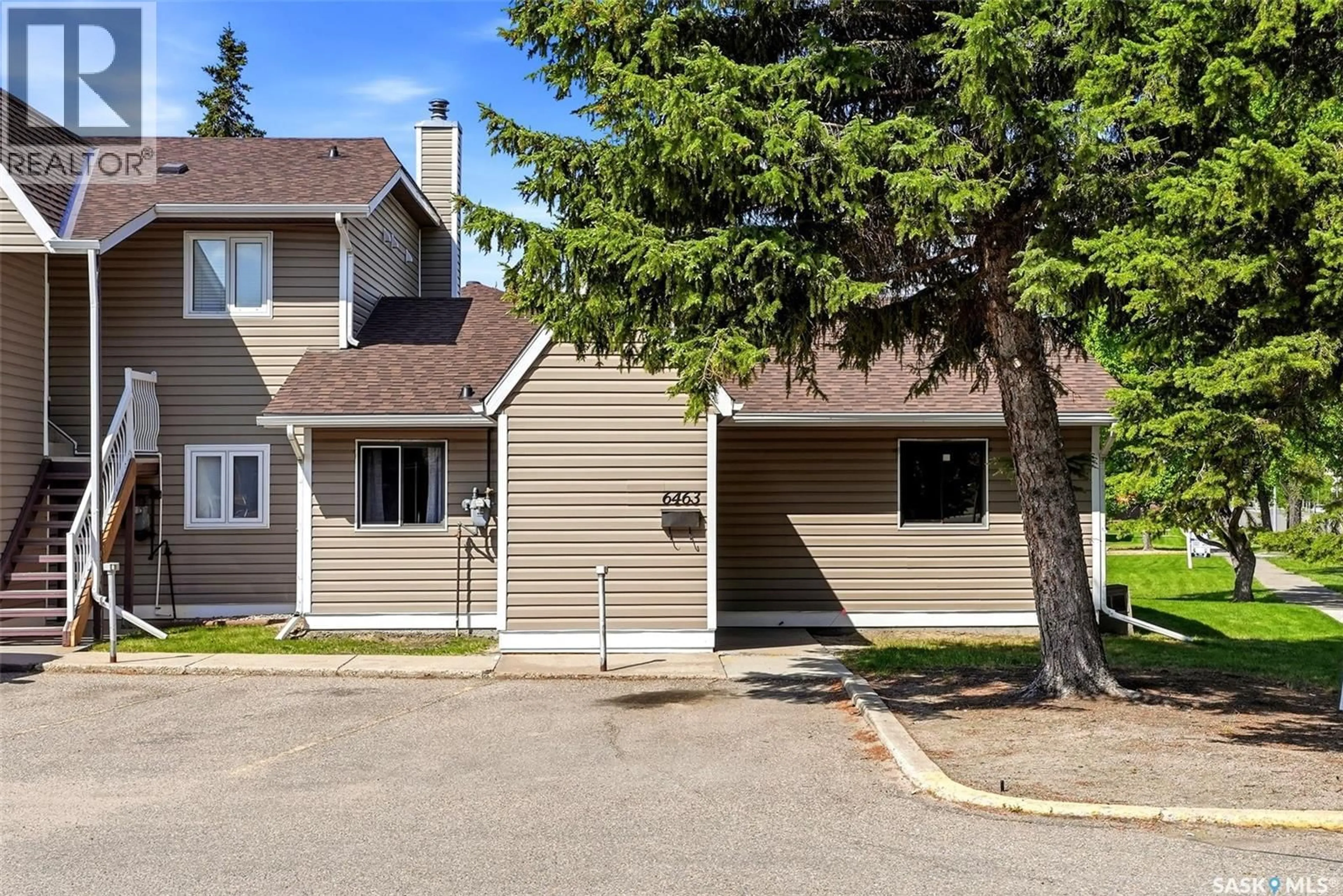 Home with vinyl exterior material, street for 6463 ROCHDALE BOULEVARD, Regina Saskatchewan S4X2Y9