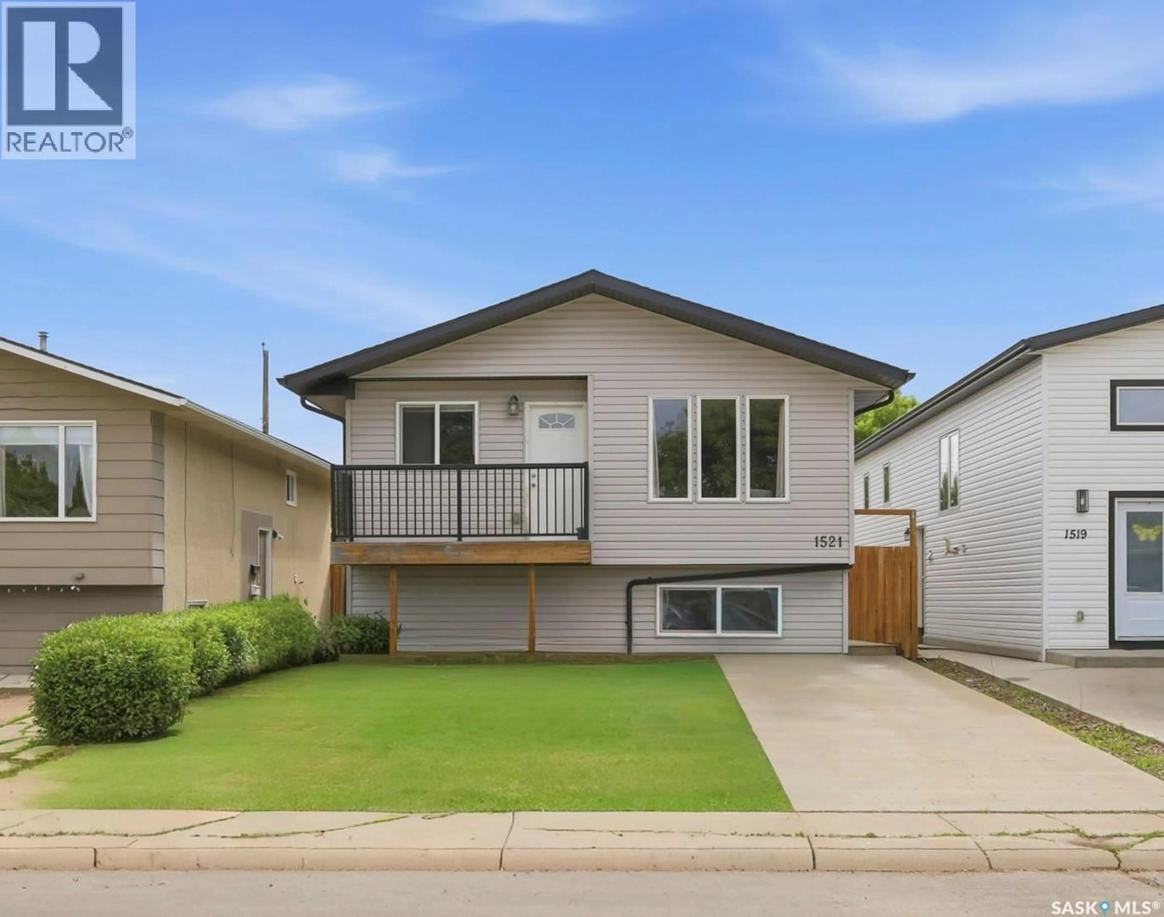 Home with vinyl exterior material, street for 1521 LAURA AVENUE, Saskatoon Saskatchewan S7N2R8