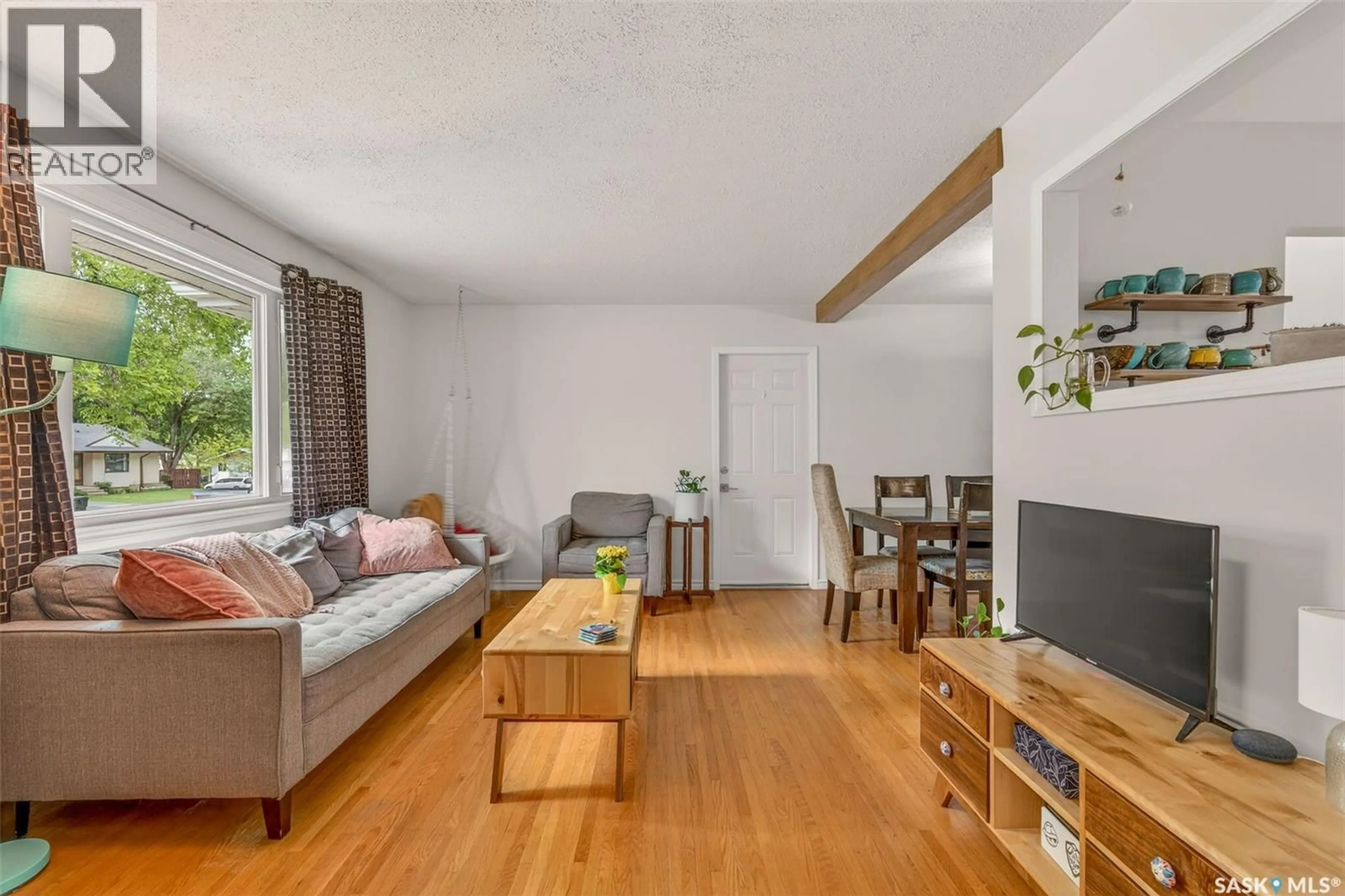 Living room with furniture, wood/laminate floor for 2326 MCDONALD AVENUE, Prince Albert Saskatchewan S6V2V6