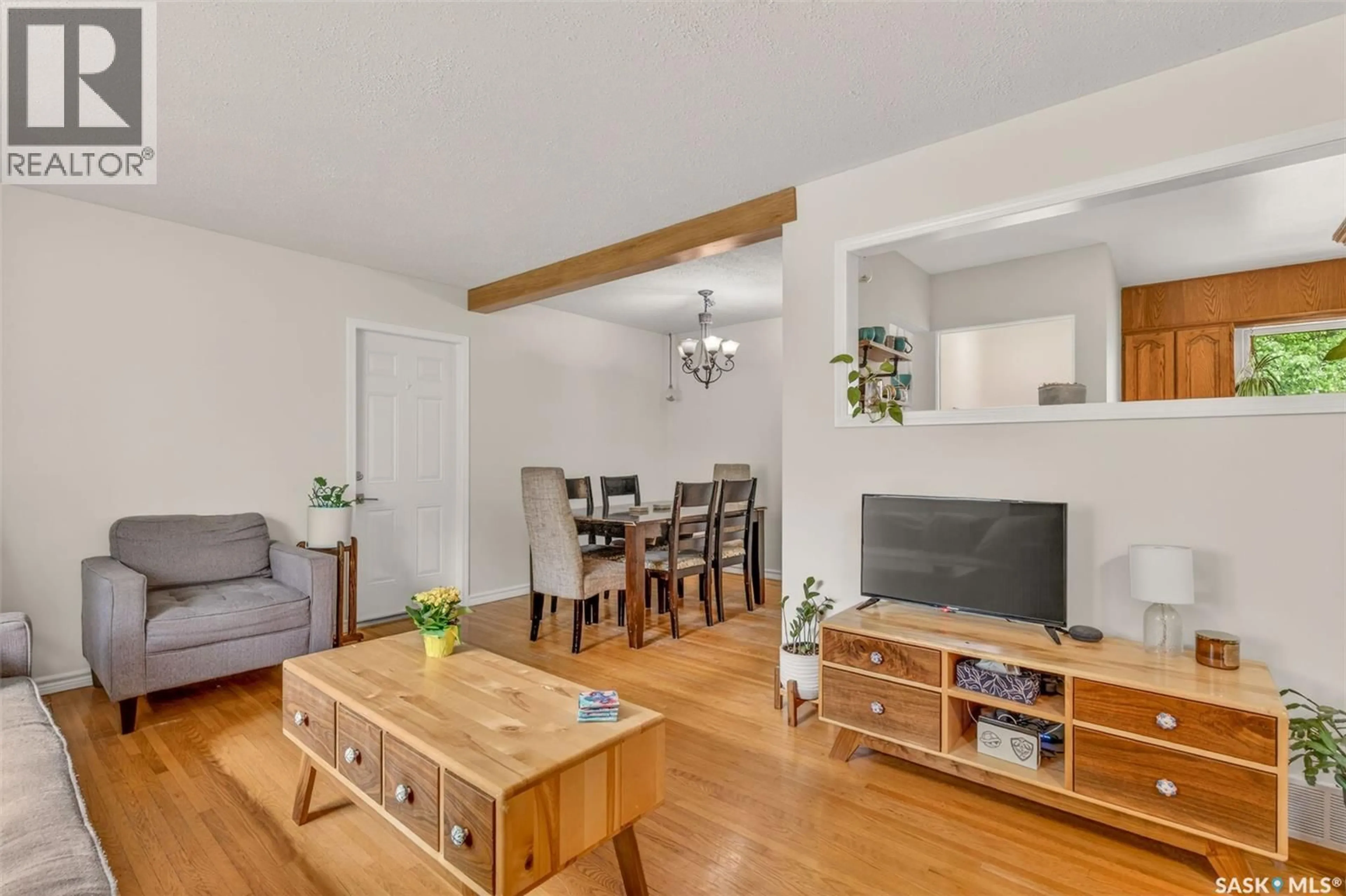 Living room with furniture, wood/laminate floor for 2326 MCDONALD AVENUE, Prince Albert Saskatchewan S6V2V6