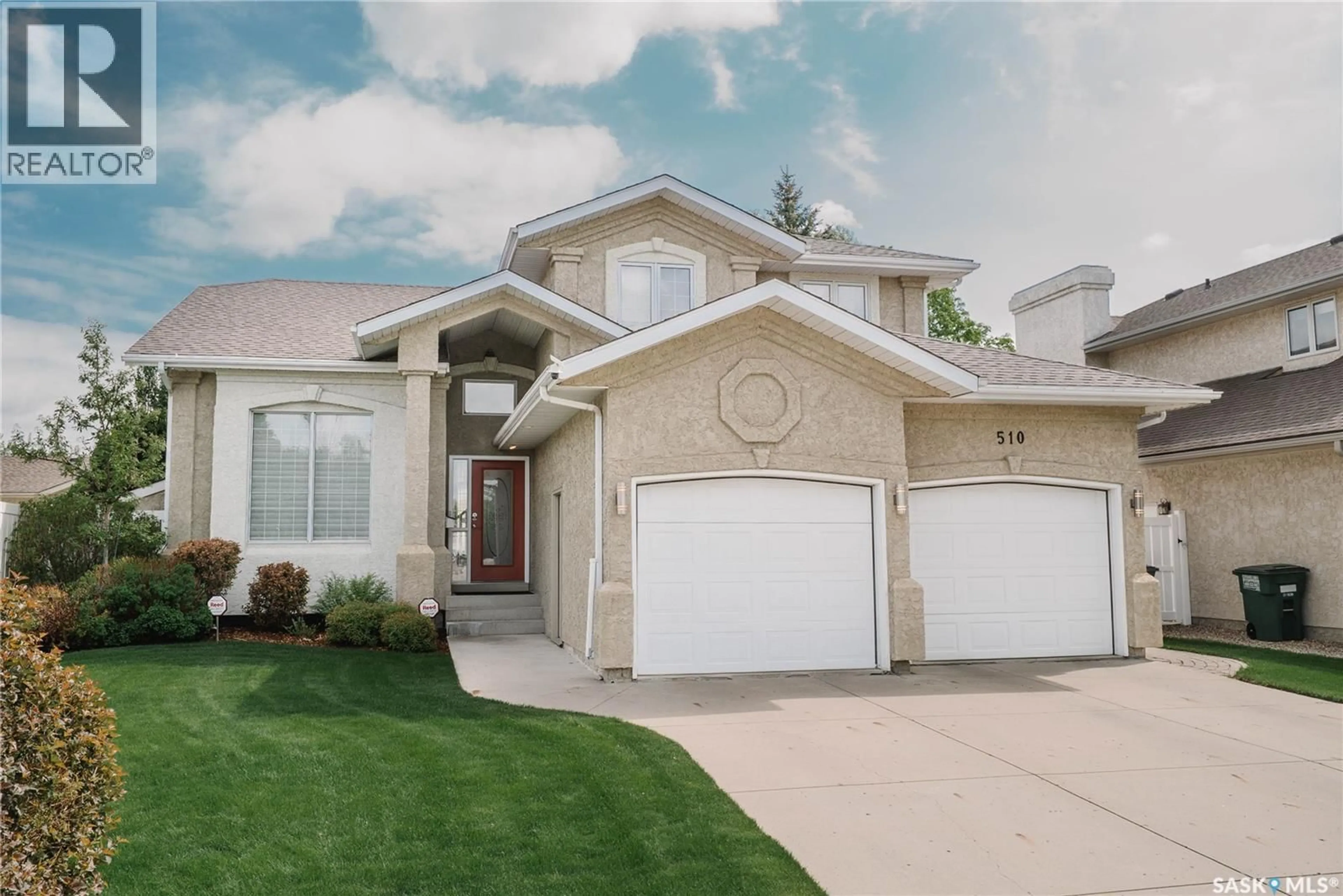 Home with vinyl exterior material, street for 510 EASTMAN COVE, Saskatoon Saskatchewan S7N4K9