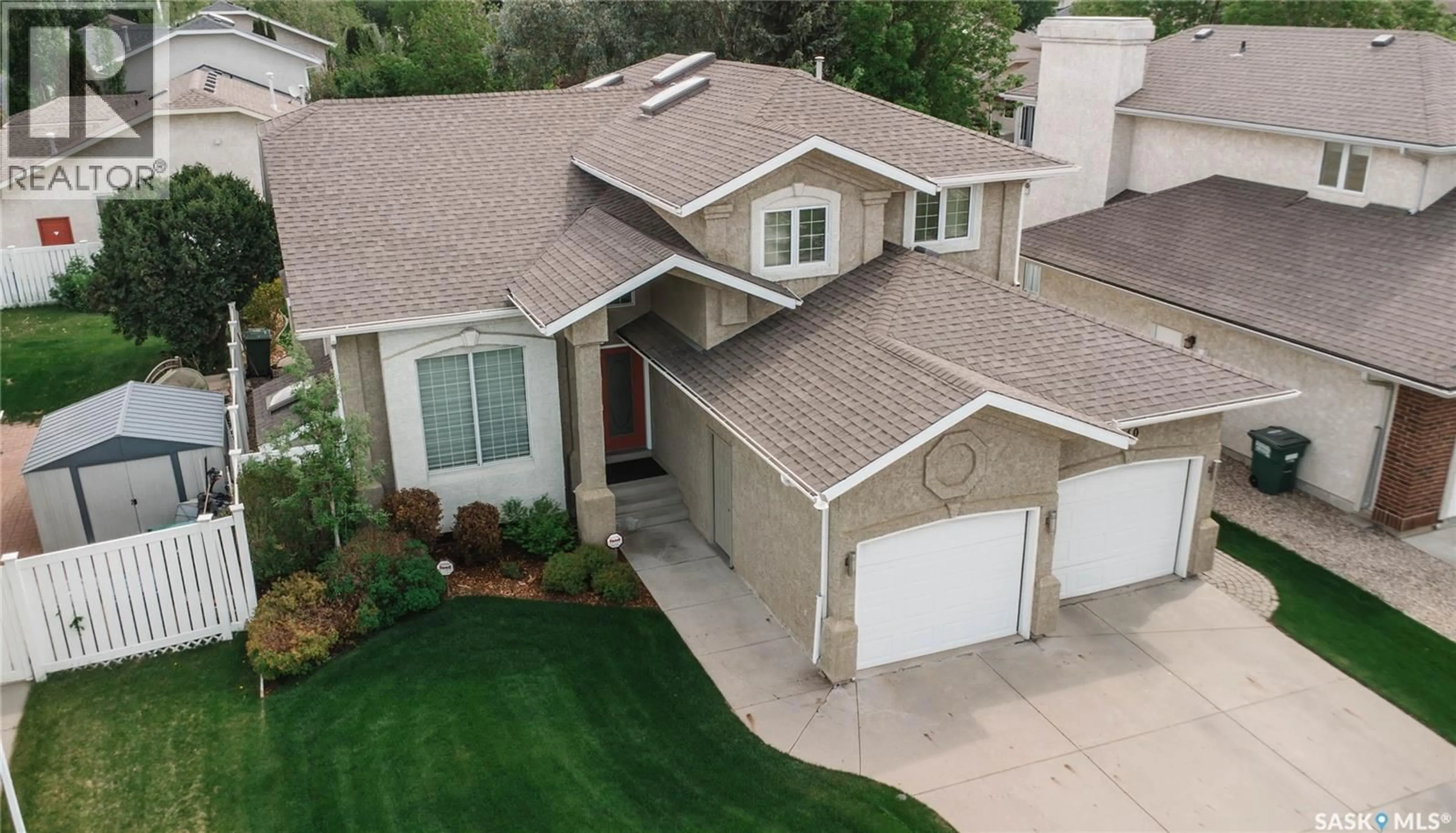 A pic from outside/outdoor area/front of a property/back of a property/a pic from drone, street for 510 EASTMAN COVE, Saskatoon Saskatchewan S7N4K9