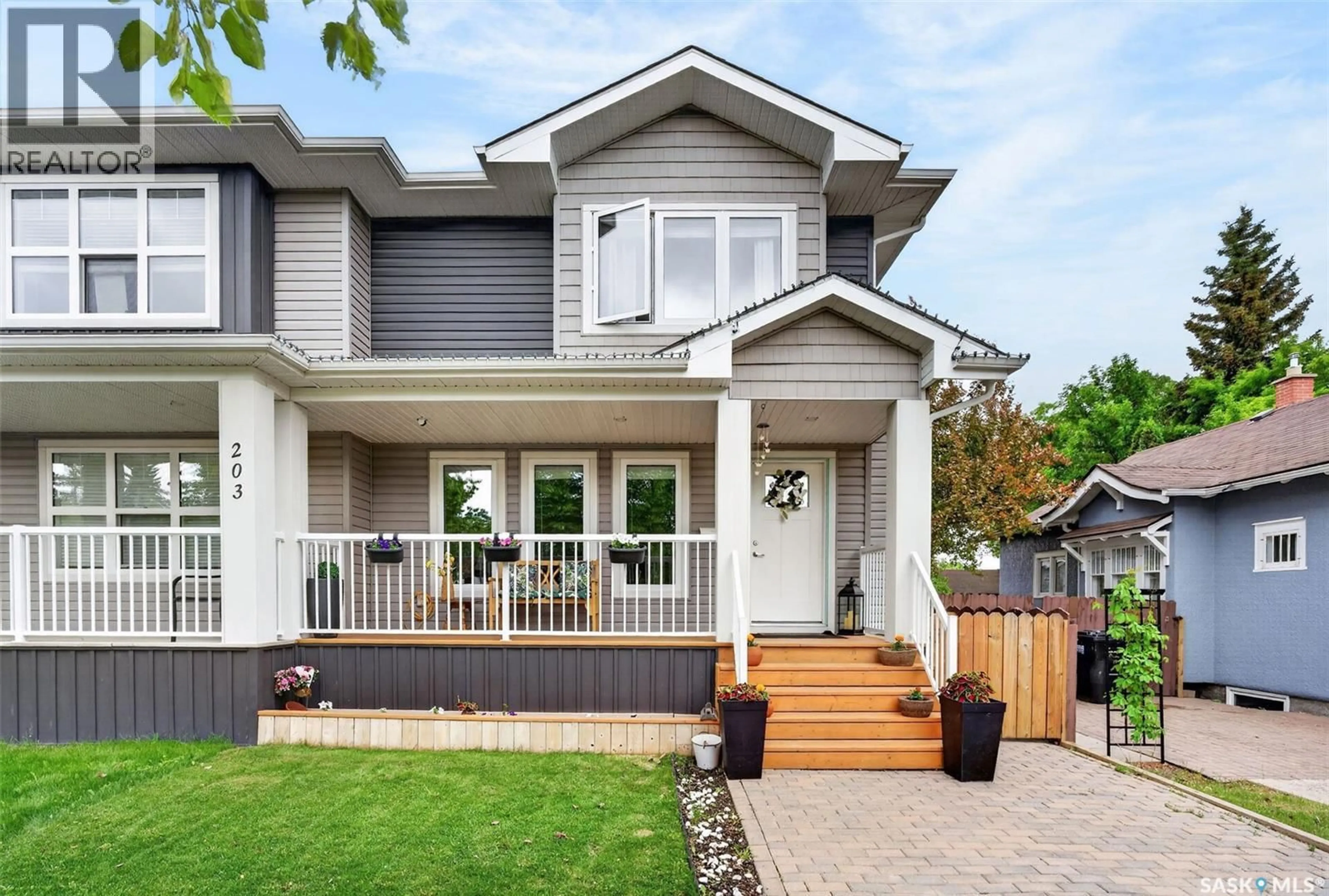 Home with vinyl exterior material, street for 203A FITZGERALD STREET, Saskatoon Saskatchewan S7N2A8