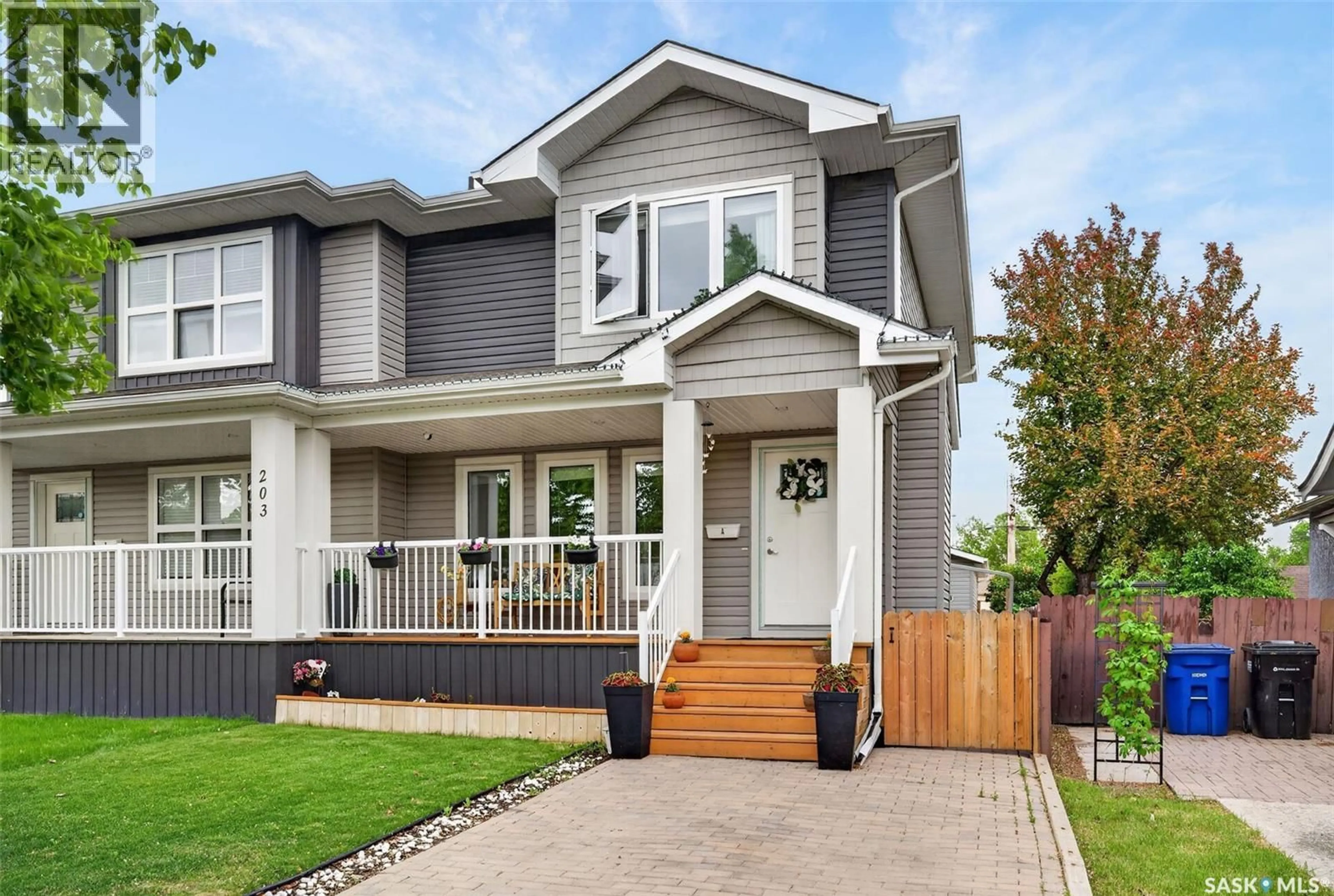 Home with vinyl exterior material, street for 203A FITZGERALD STREET, Saskatoon Saskatchewan S7N2A8
