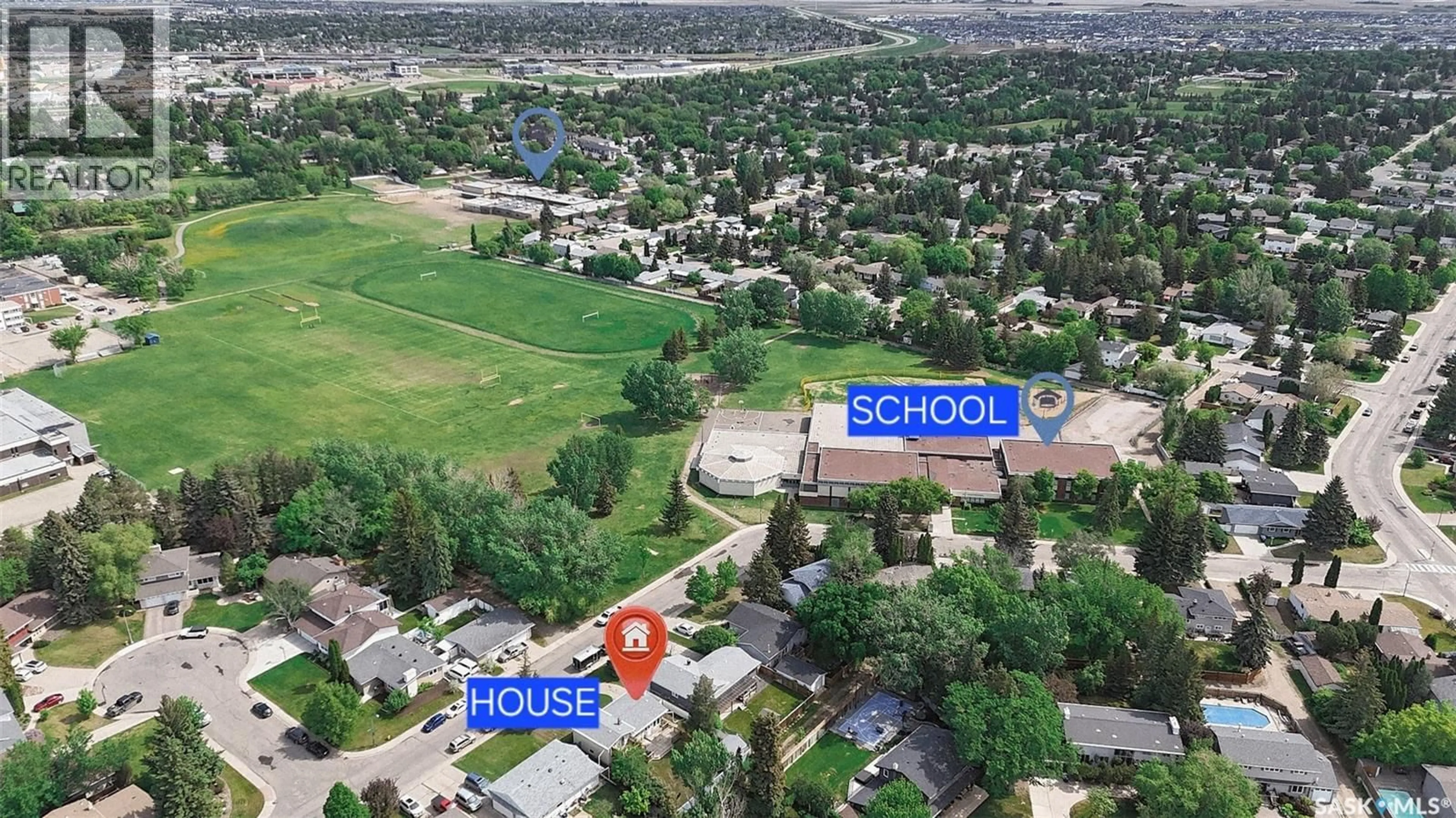 A pic from outside/outdoor area/front of a property/back of a property/a pic from drone, street for 3421 HARRINGTON STREET, Saskatoon Saskatchewan S7H3Y3
