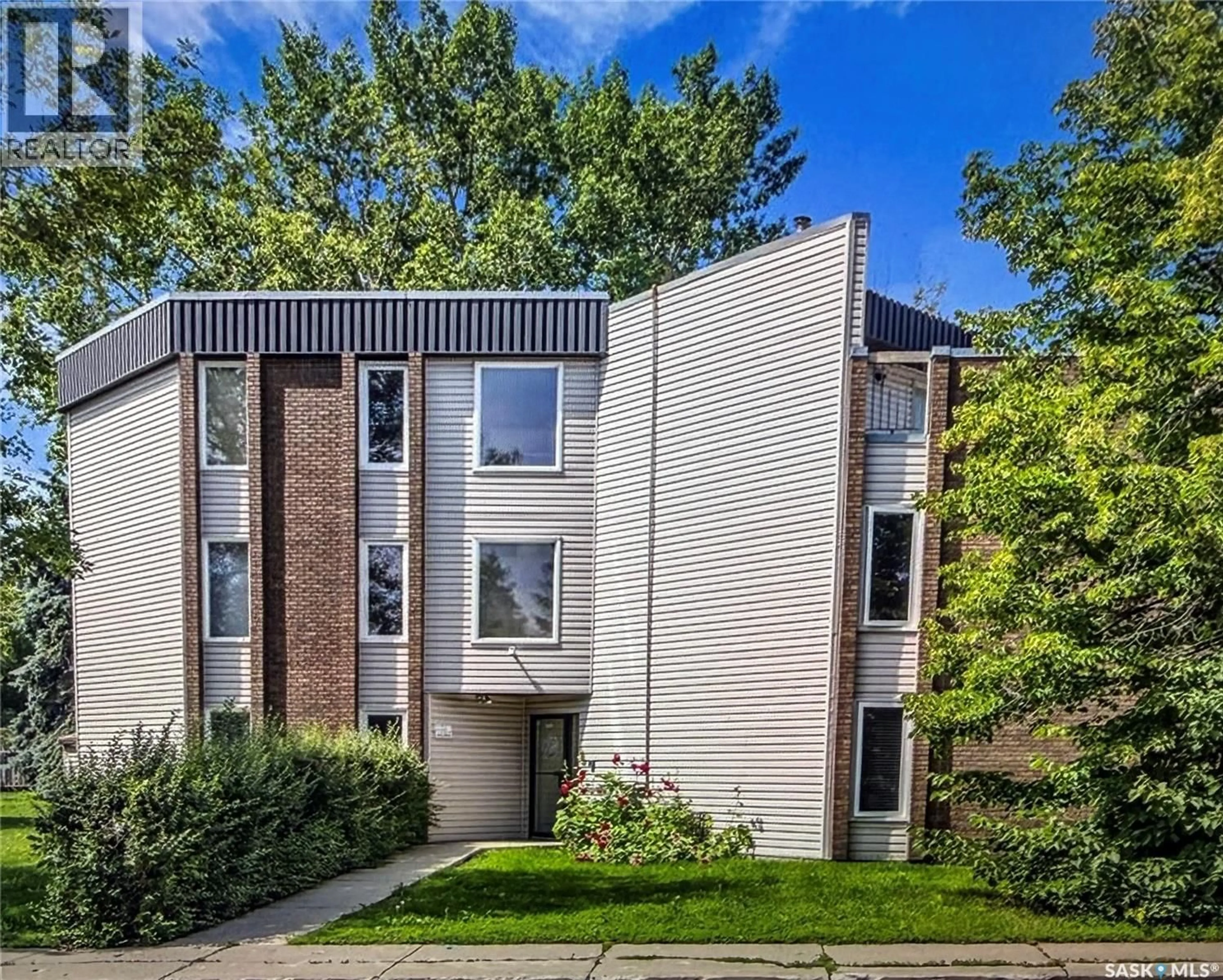 Home with brick exterior material, street for 302 - 201 TAIT CRESCENT, Saskatoon Saskatchewan S7H5L2