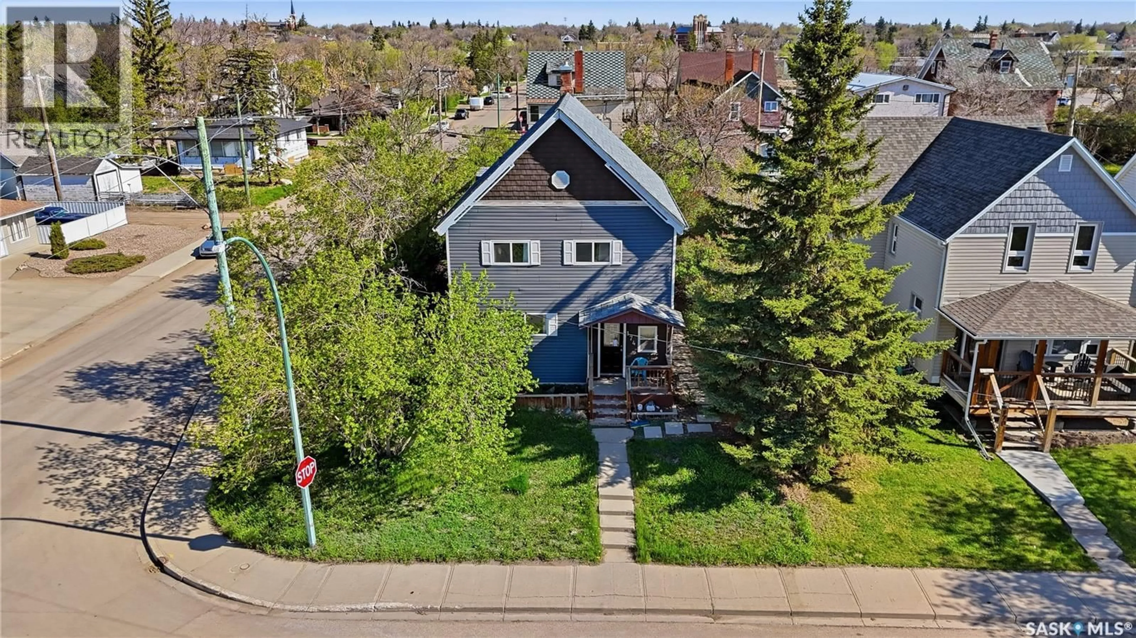 A pic from outside/outdoor area/front of a property/back of a property/a pic from drone, street for 174 OMINICA STREET, Moose Jaw Saskatchewan S6H1X2