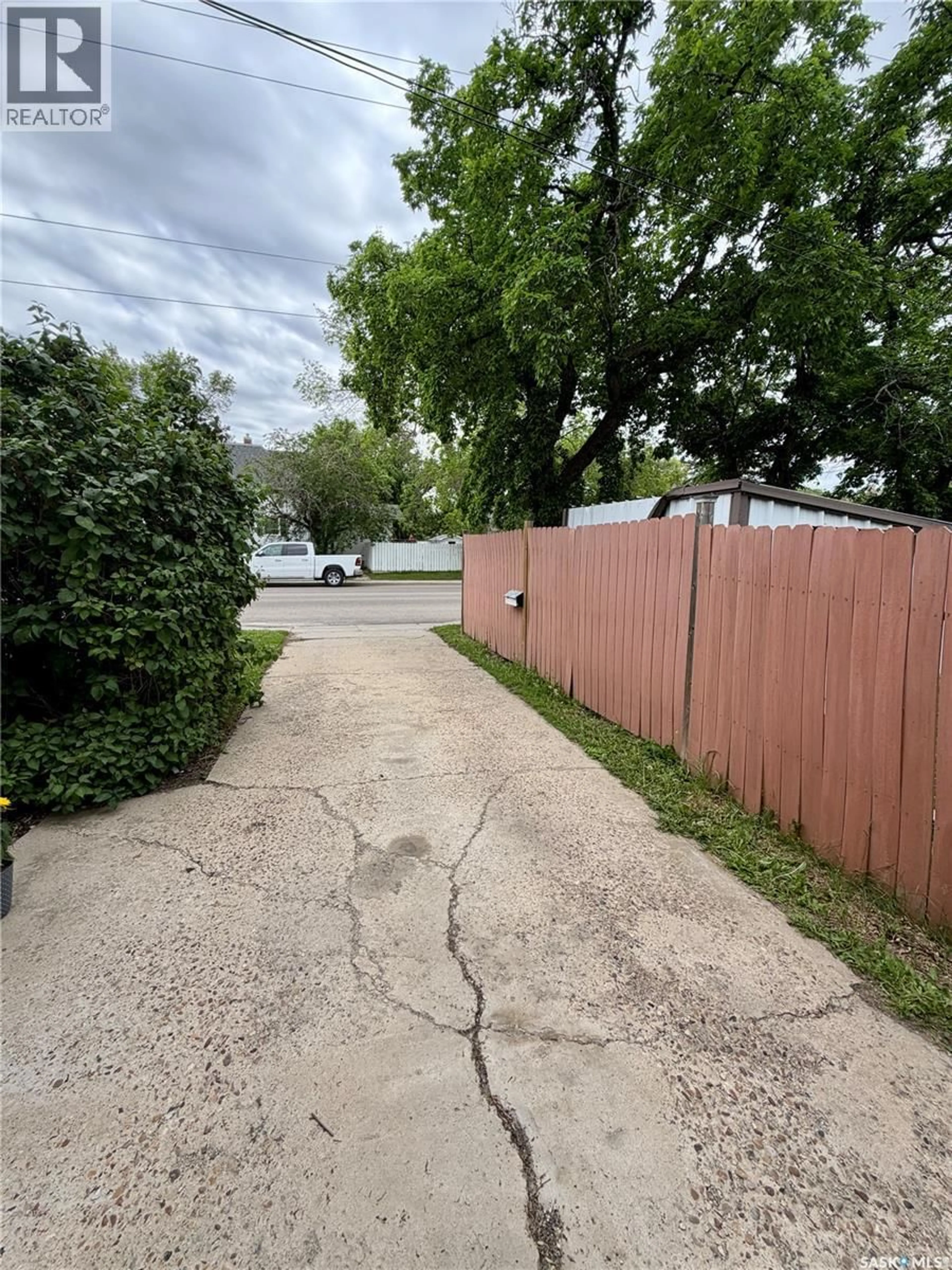 A pic from outside/outdoor area/front of a property/back of a property/a pic from drone, street for 233 HERBERT STREET, Swift Current Saskatchewan S9H1M3