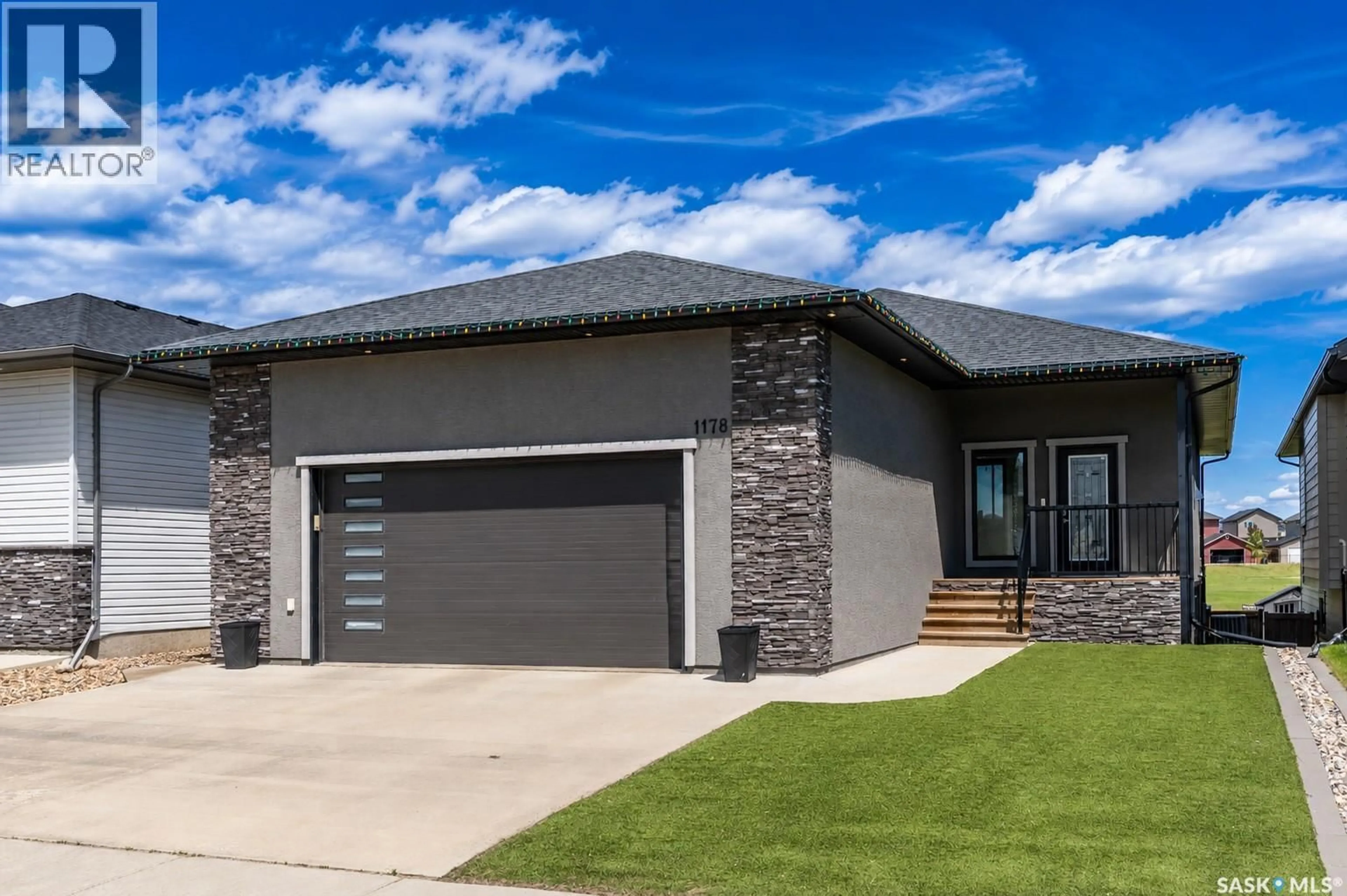 Home with brick exterior material, street for 1178 MEIER DRIVE, Moose Jaw Saskatchewan S6J0B2