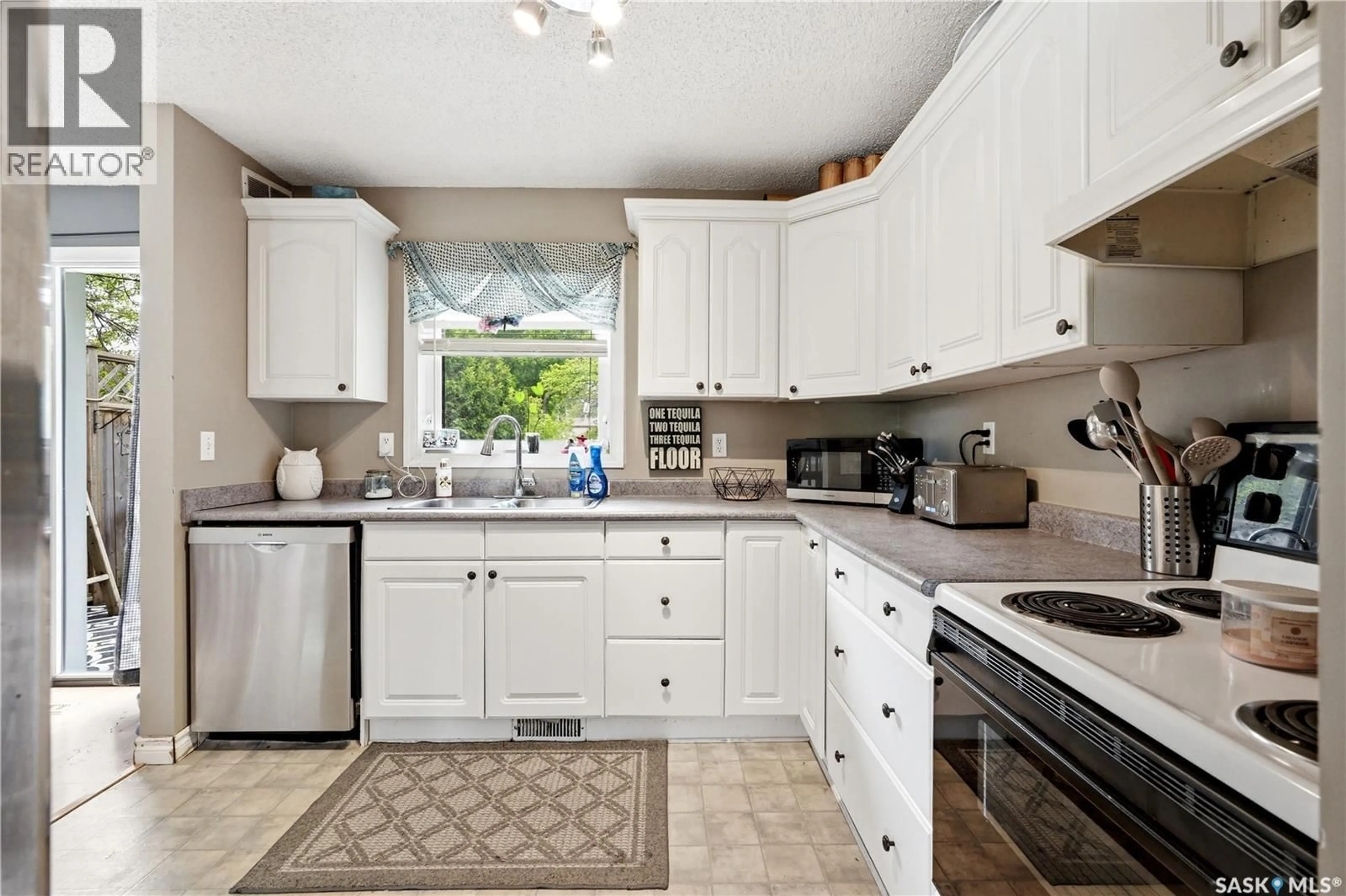 Open concept kitchen, ceramic/tile floor for 350 WEYAKWIN DRIVE, Saskatoon Saskatchewan S7J4H5