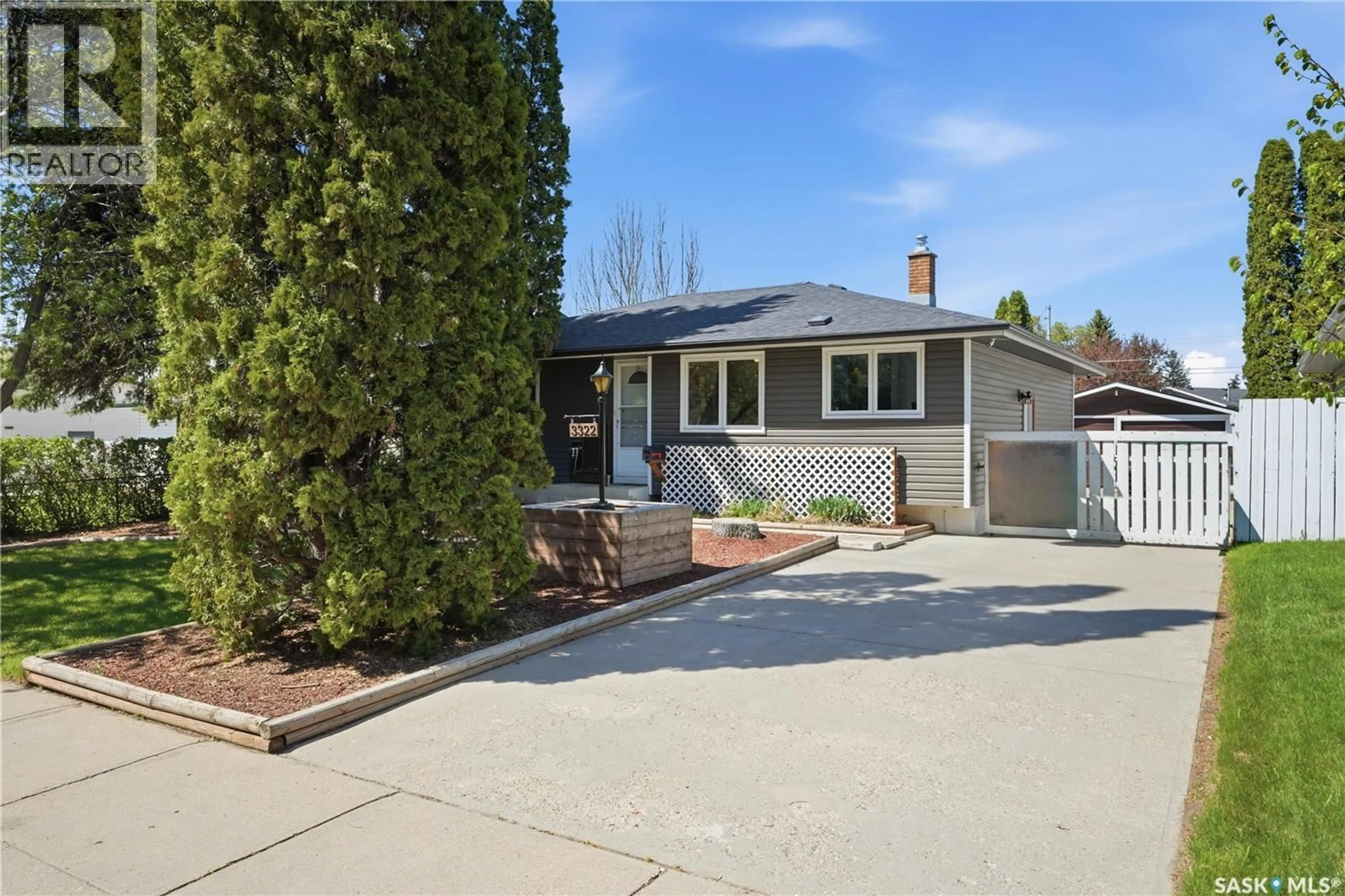 Home with vinyl exterior material, street for 3322 HARRINGTON STREET, Saskatoon Saskatchewan S7H3Y1