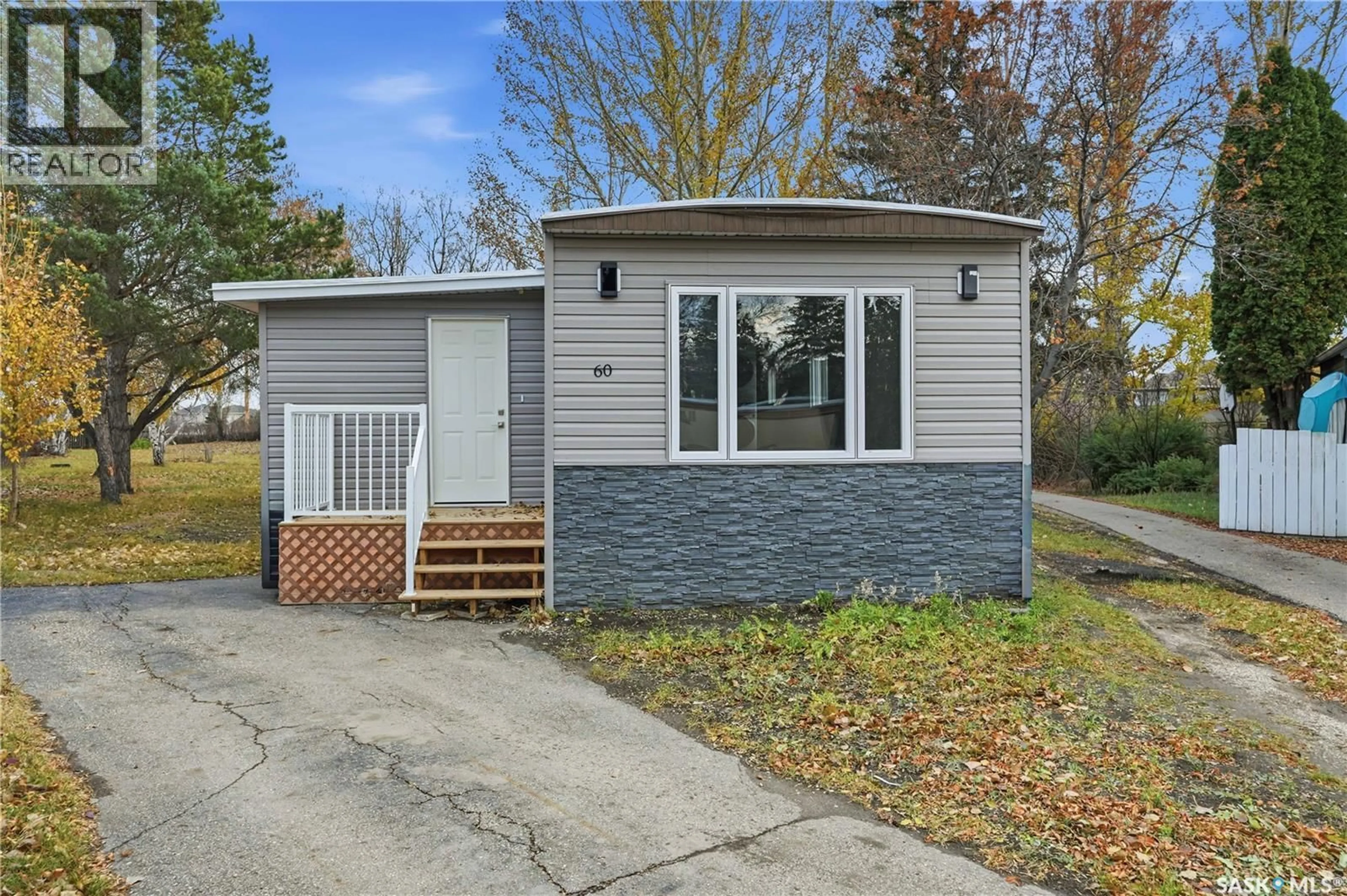 Home with vinyl exterior material, street for 60 1035 BOYCHUK DRIVE, Saskatoon Saskatchewan S7H5B2