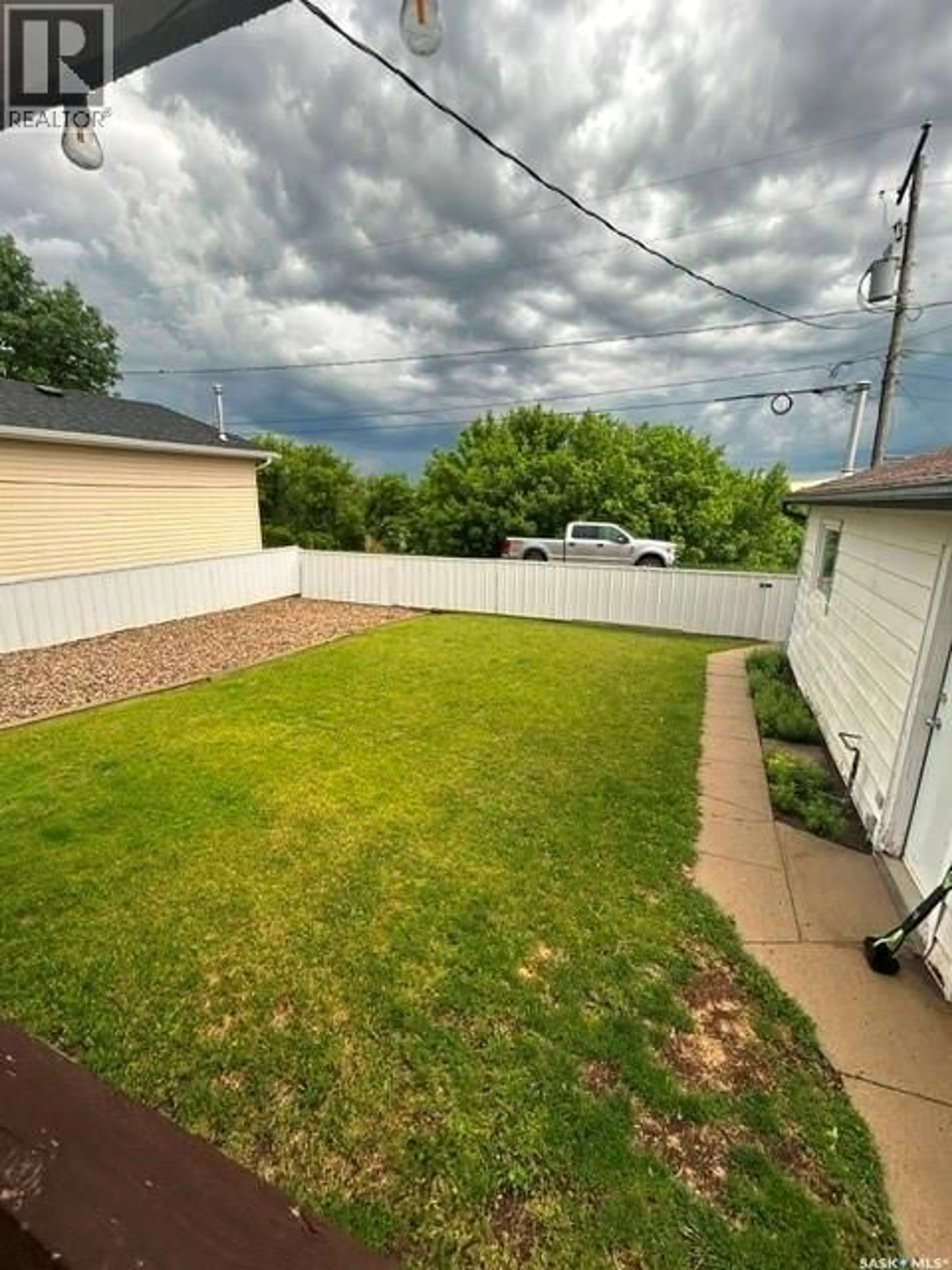 A pic from outside/outdoor area/front of a property/back of a property/a pic from drone, unknown for 112 MCDONALD ROAD, Estevan Saskatchewan S4A0B8