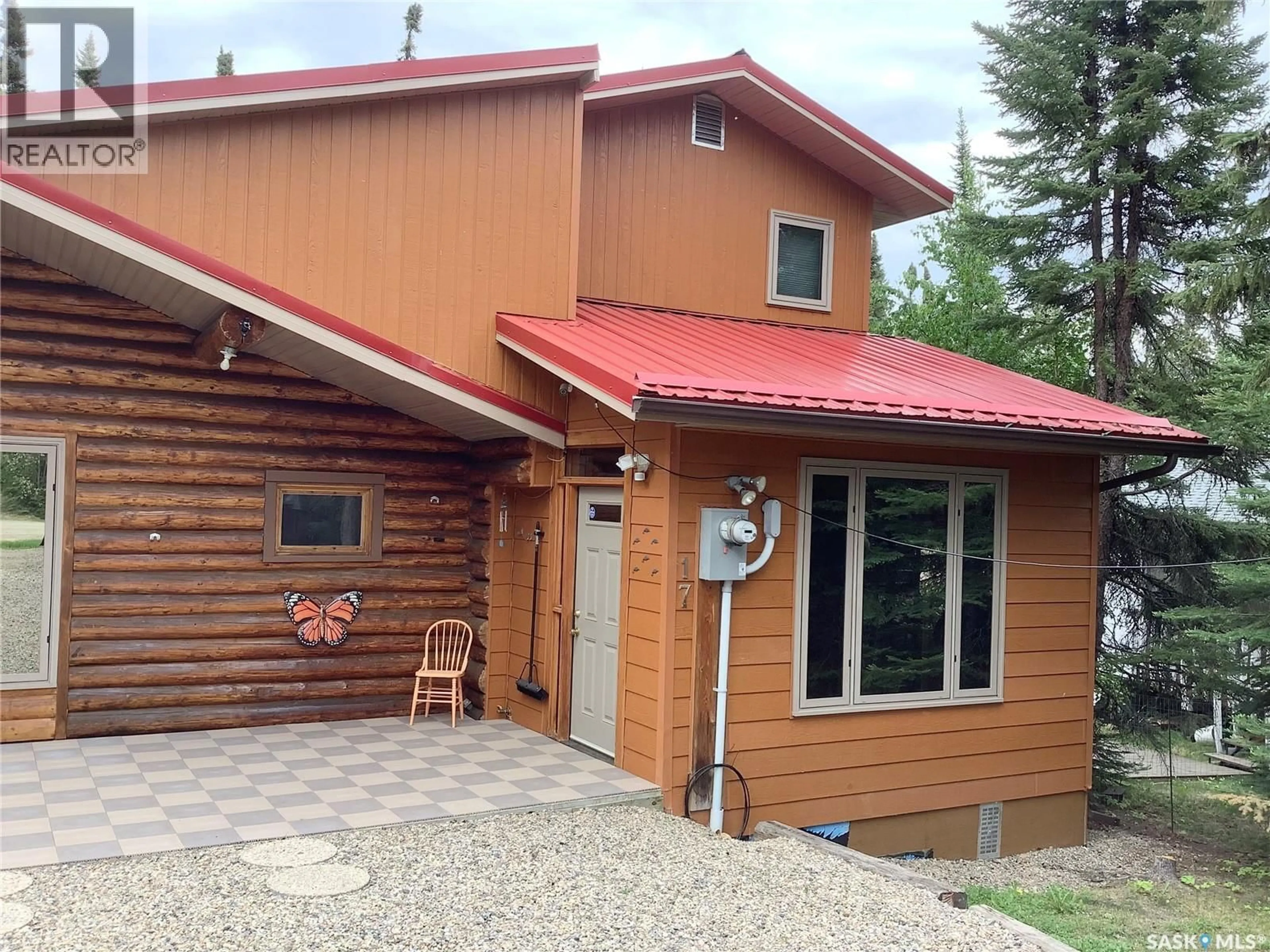 Home with vinyl exterior material, street for 17 WOLF PLACE, Northern Admin District Saskatchewan S0J1W0