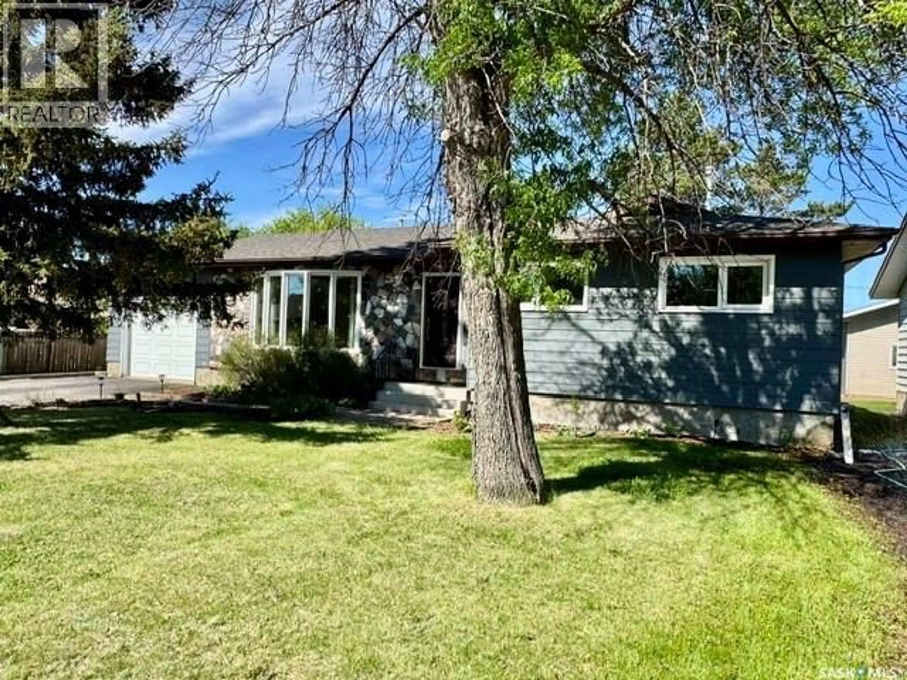 A pic from outside/outdoor area/front of a property/back of a property/a pic from drone, street for 503 2ND STREET, Watson Saskatchewan S0K4V0