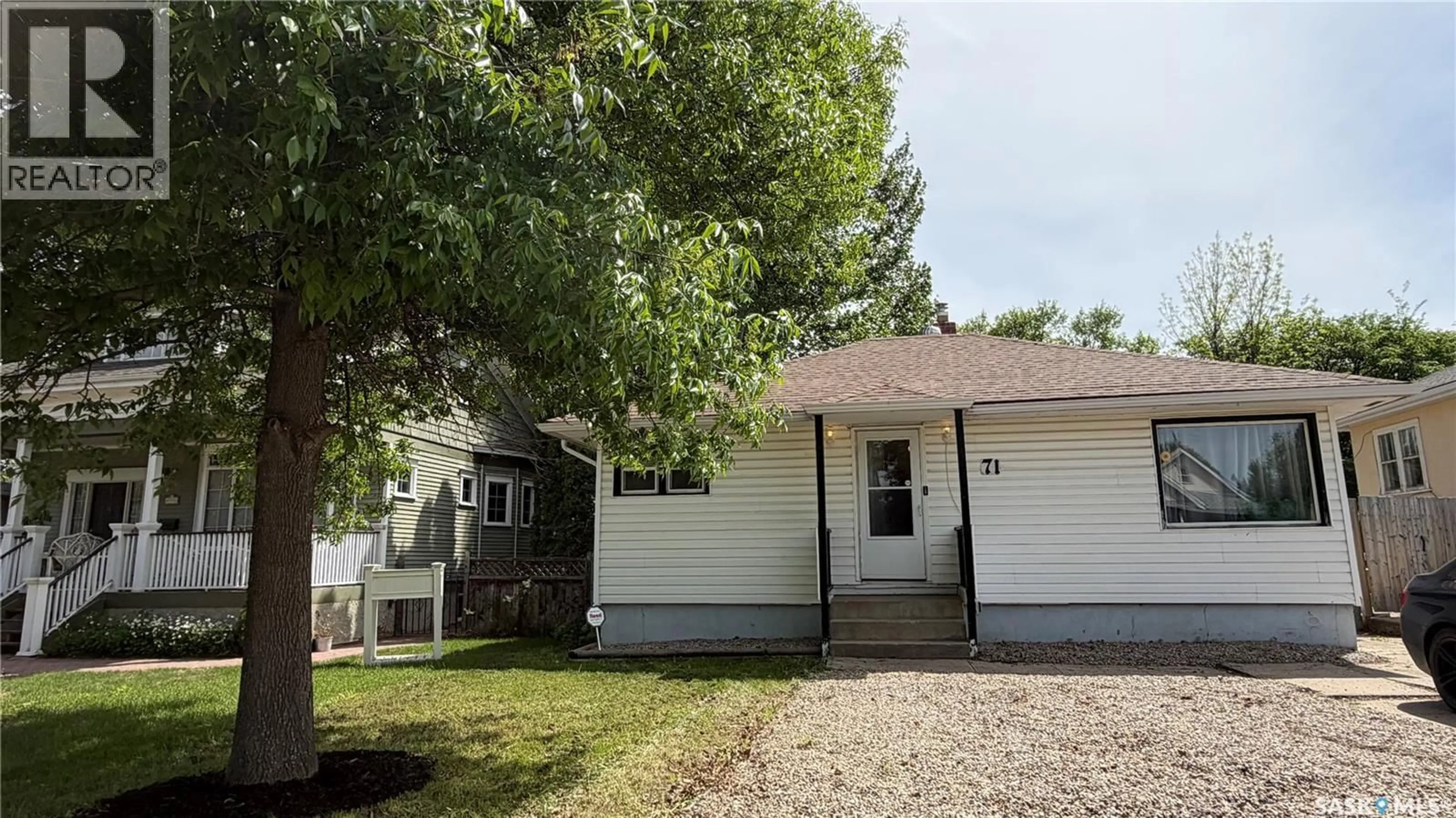 Home with vinyl exterior material, street for 71 22ND STREET, Prince Albert Saskatchewan S6V1M8