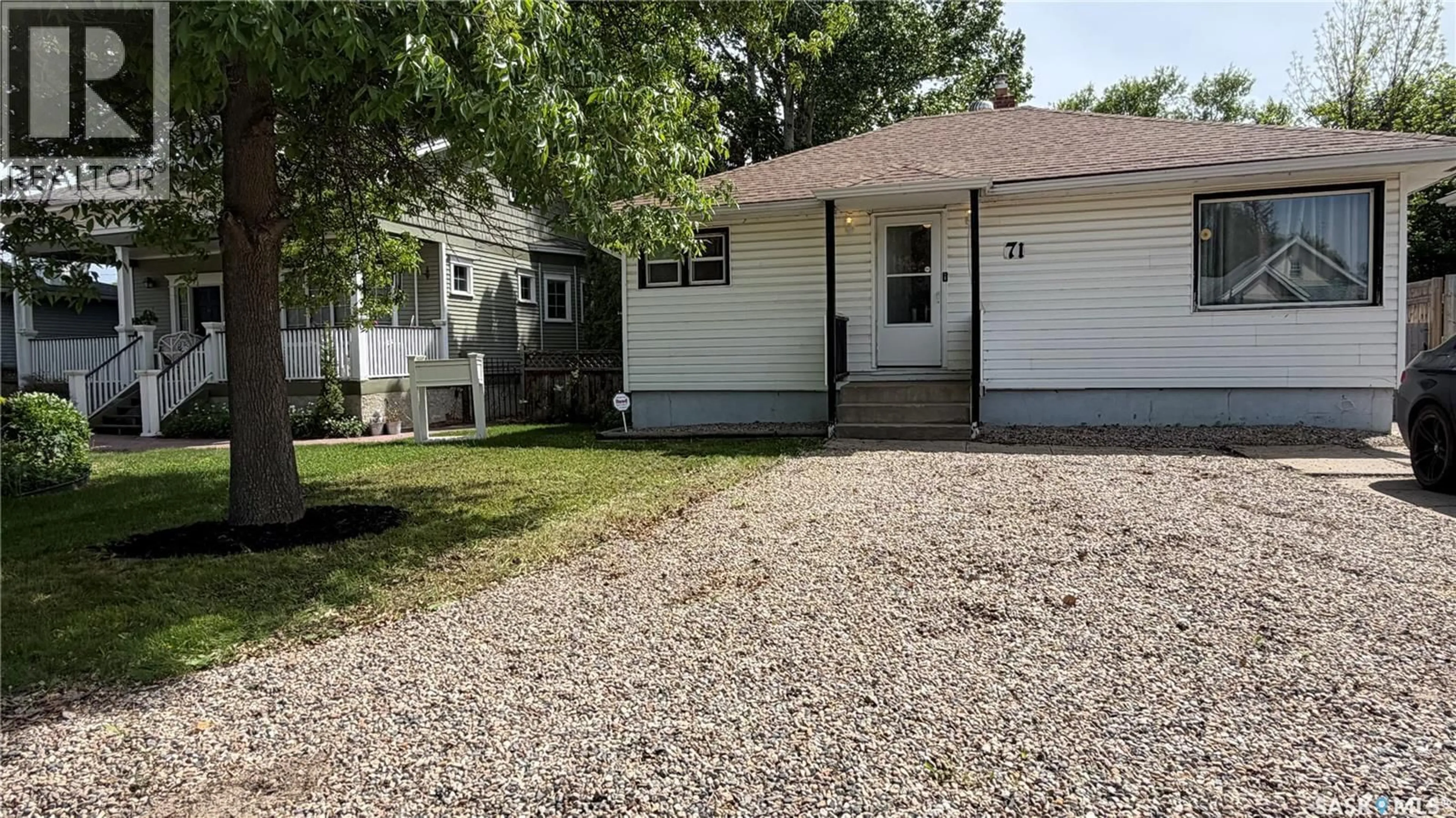 Home with vinyl exterior material, street for 71 22ND STREET, Prince Albert Saskatchewan S6V1M8