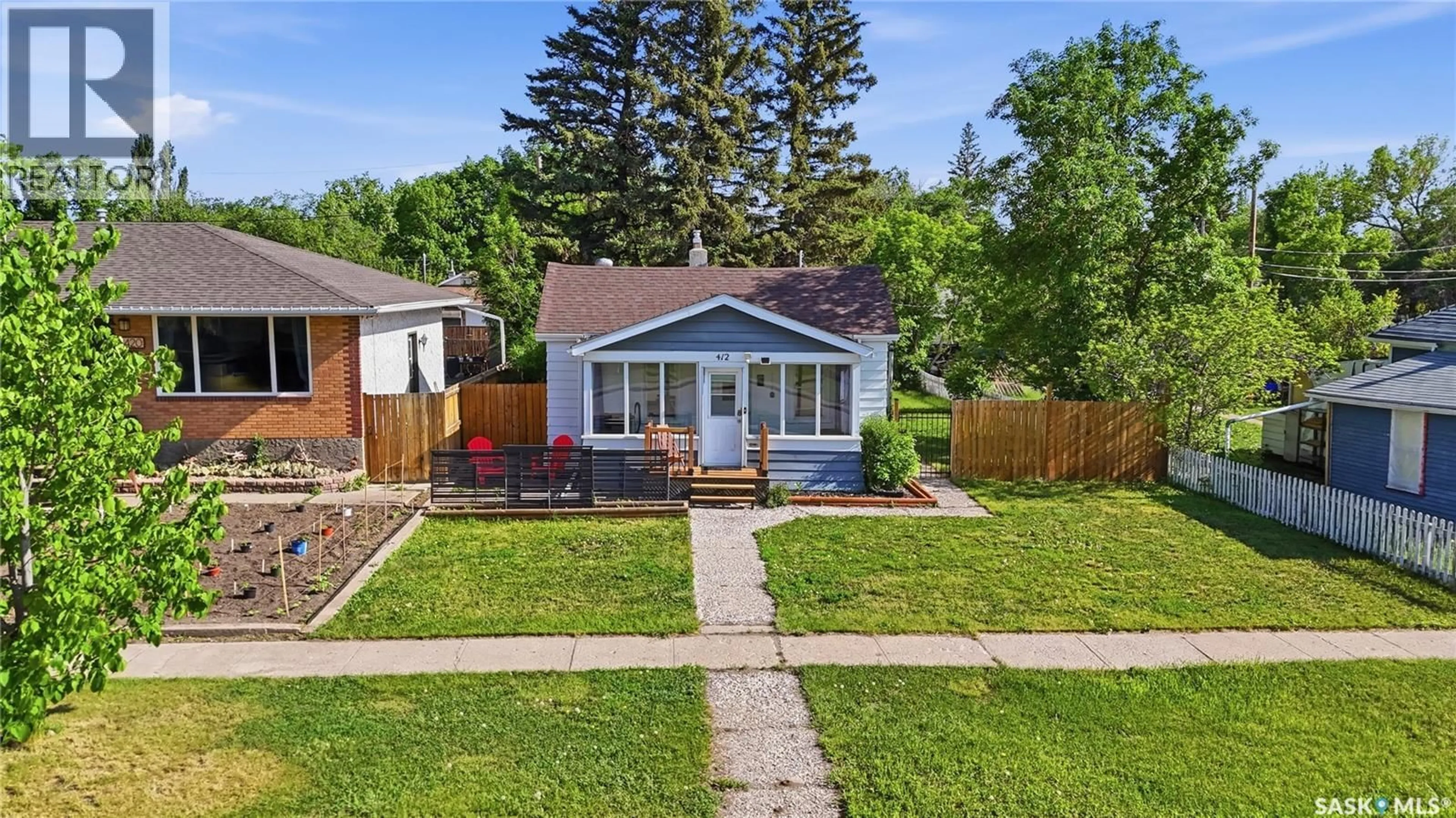 A pic from outside/outdoor area/front of a property/back of a property/a pic from drone, street for 412 VAUGHAN STREET, Moose Jaw Saskatchewan S6H5N2