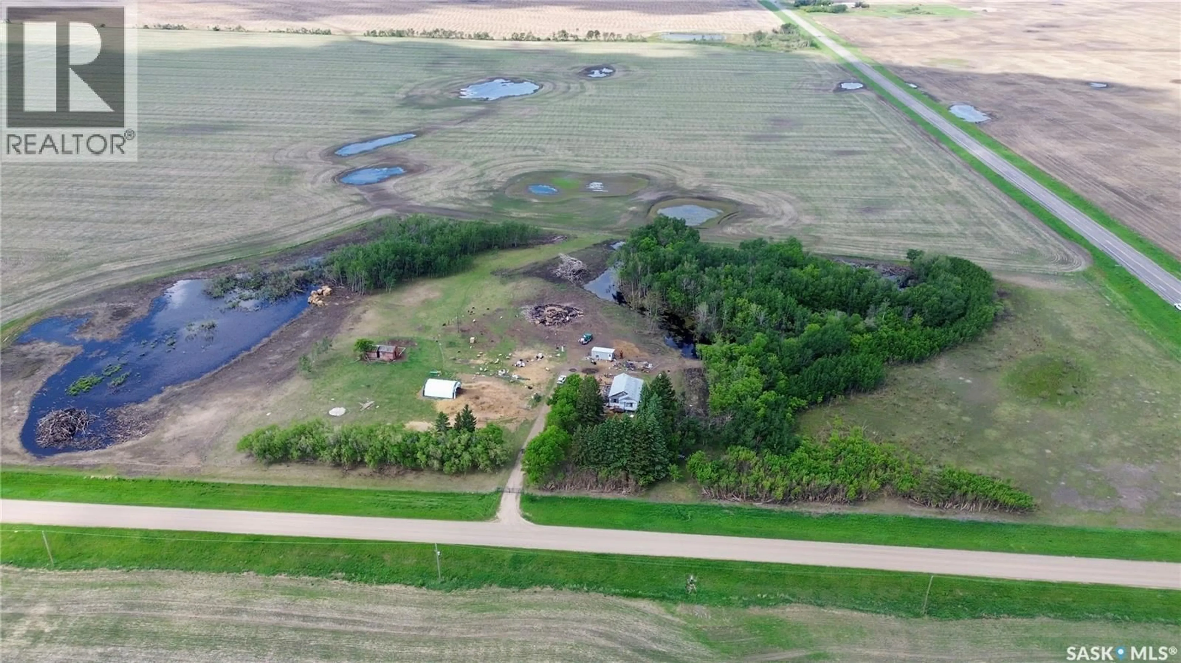 A pic from outside/outdoor area/front of a property/back of a property/a pic from drone, building for DENHOLM ROAD, North Battleford Rm No. 437 Saskatchewan S0M0R0