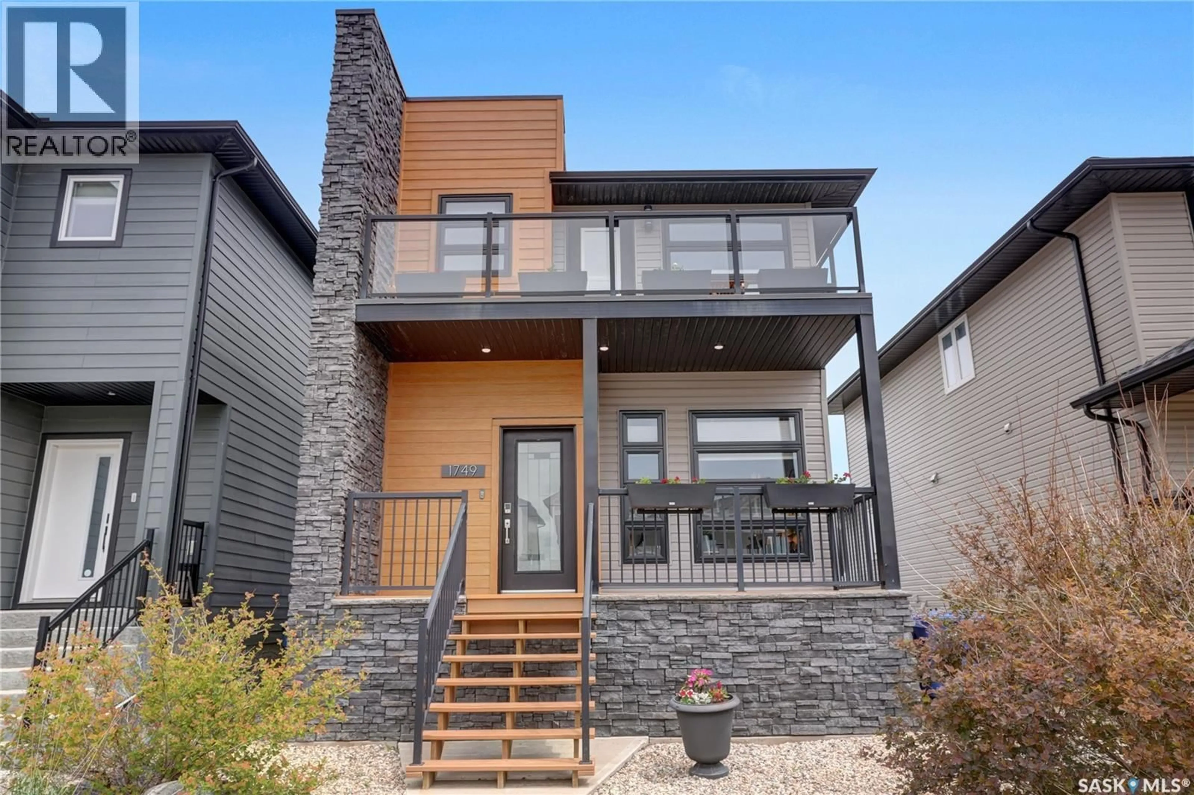 Home with brick exterior material, street for 1749 11TH AVENUE, Moose Jaw Saskatchewan S6J0B3