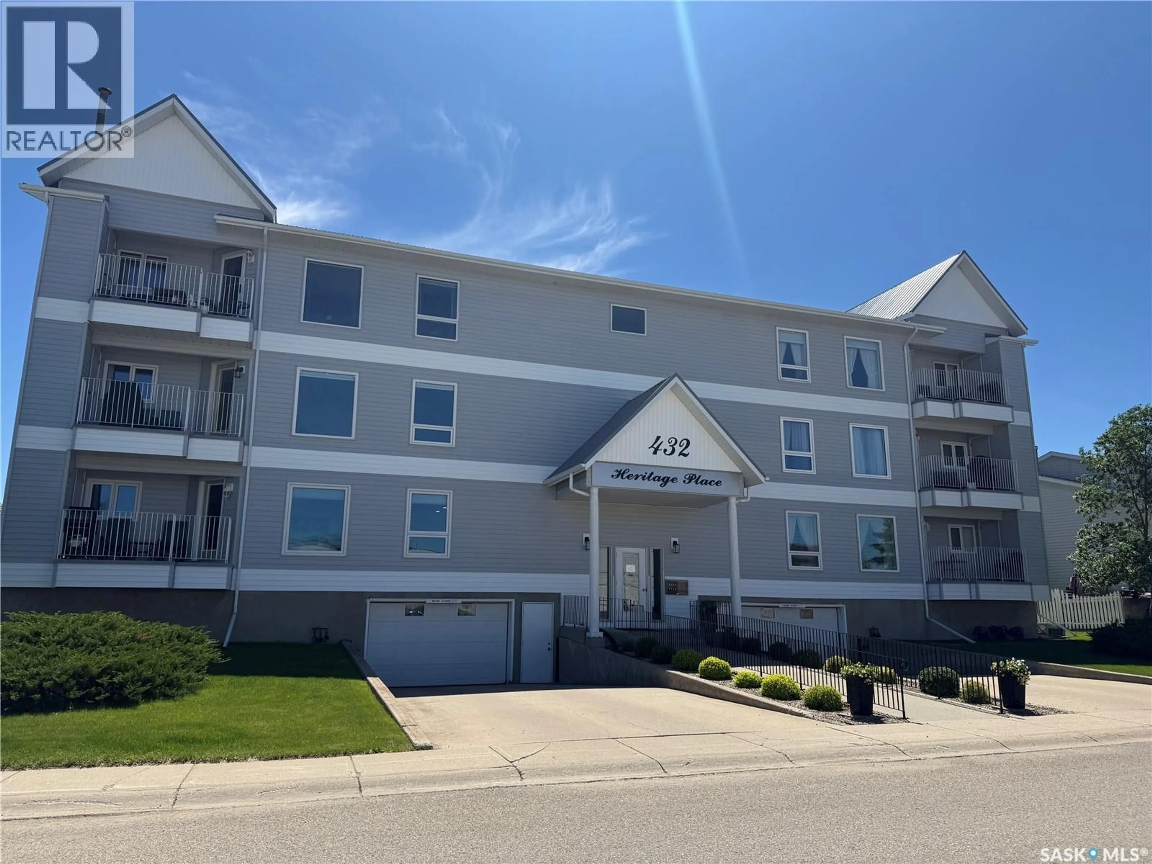 A pic from outside/outdoor area/front of a property/back of a property/a pic from drone, unknown for 204 432 HERITAGE DRIVE, Estevan Saskatchewan S4A2P6