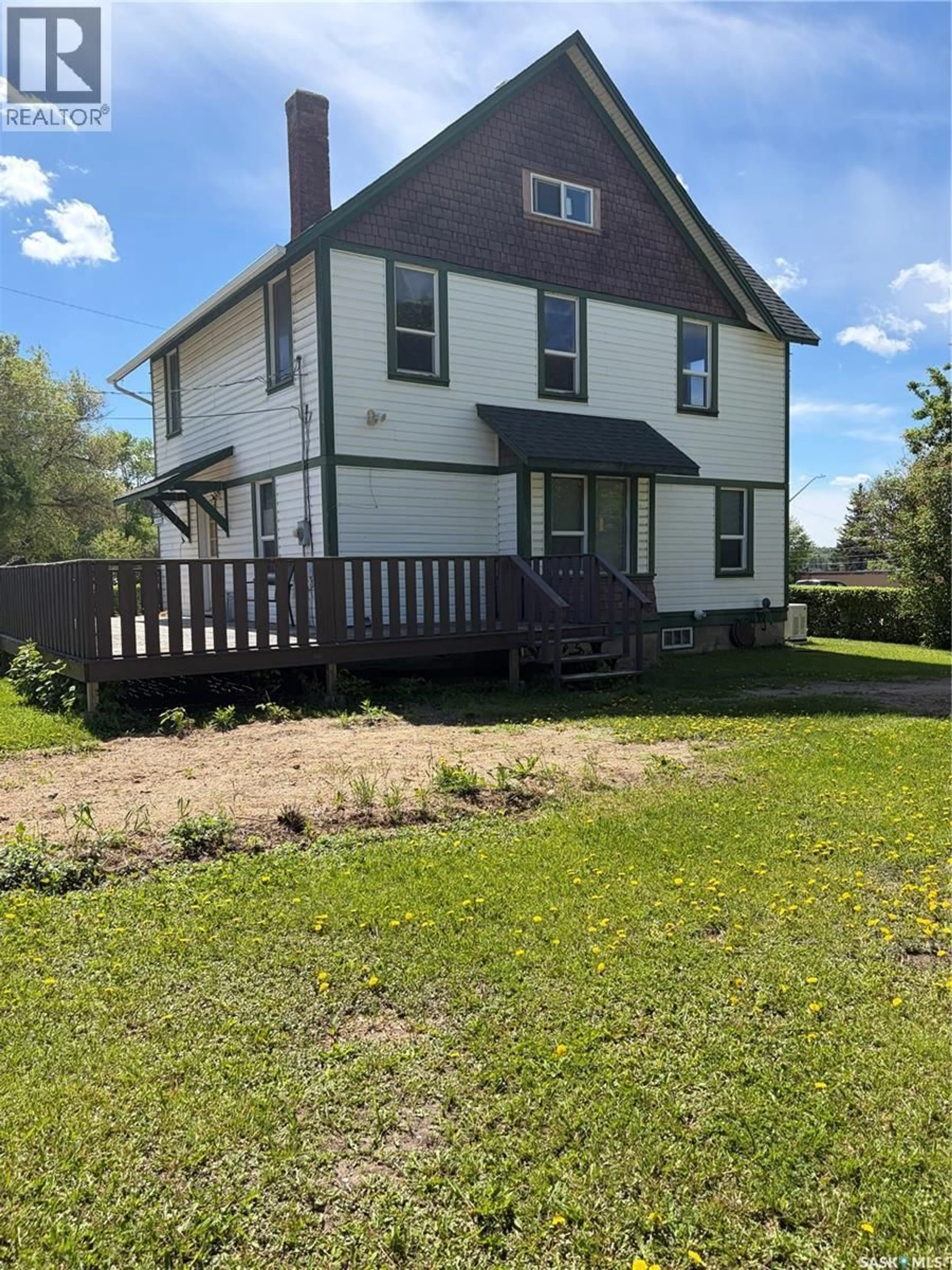 A pic from outside/outdoor area/front of a property/back of a property/a pic from drone, building for 102 2ND AVENUE, Big River Saskatchewan S0J0E0