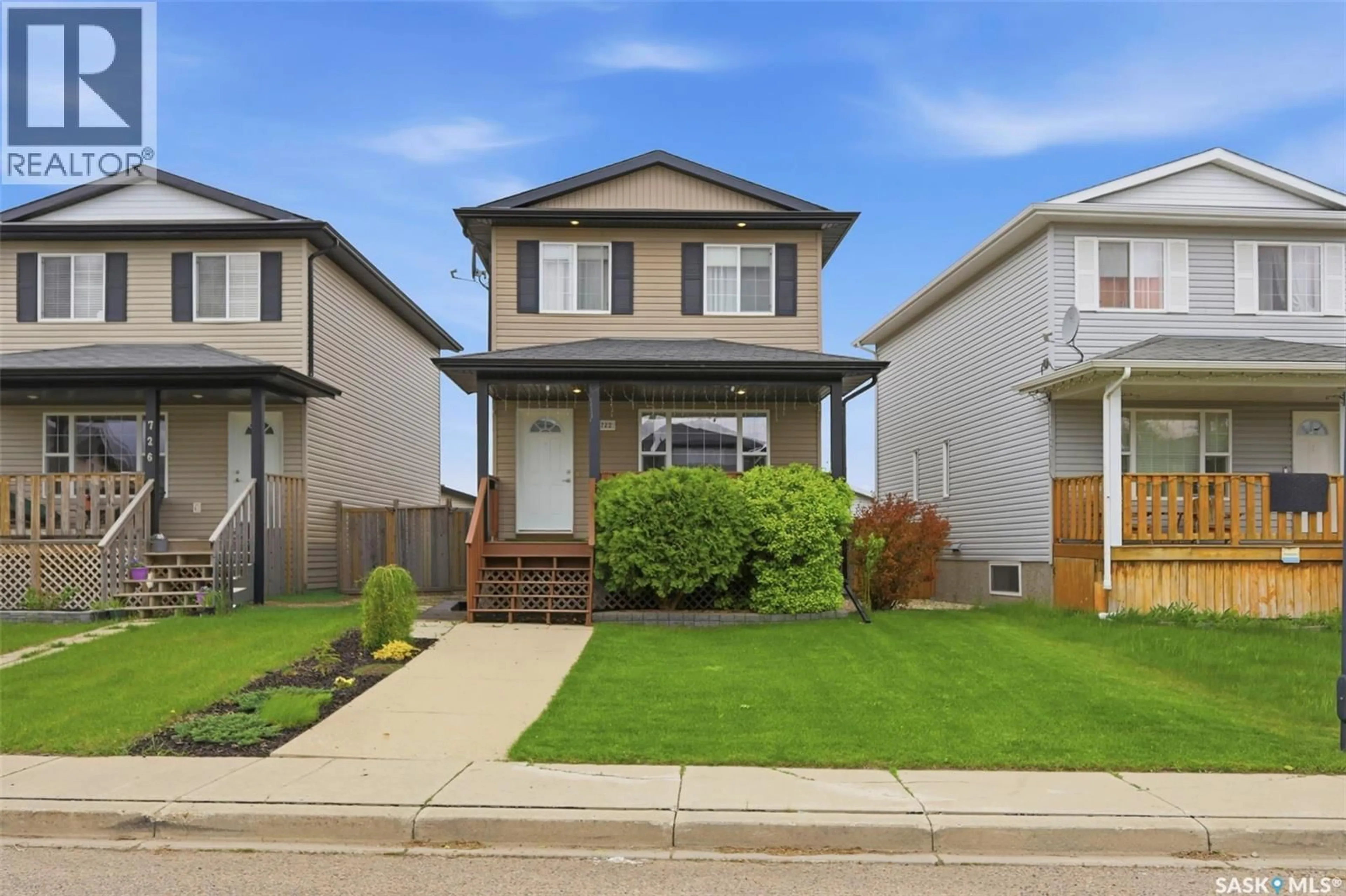 Home with vinyl exterior material, street for 722 LAMARSH LANE, Saskatoon Saskatchewan S7W1B6