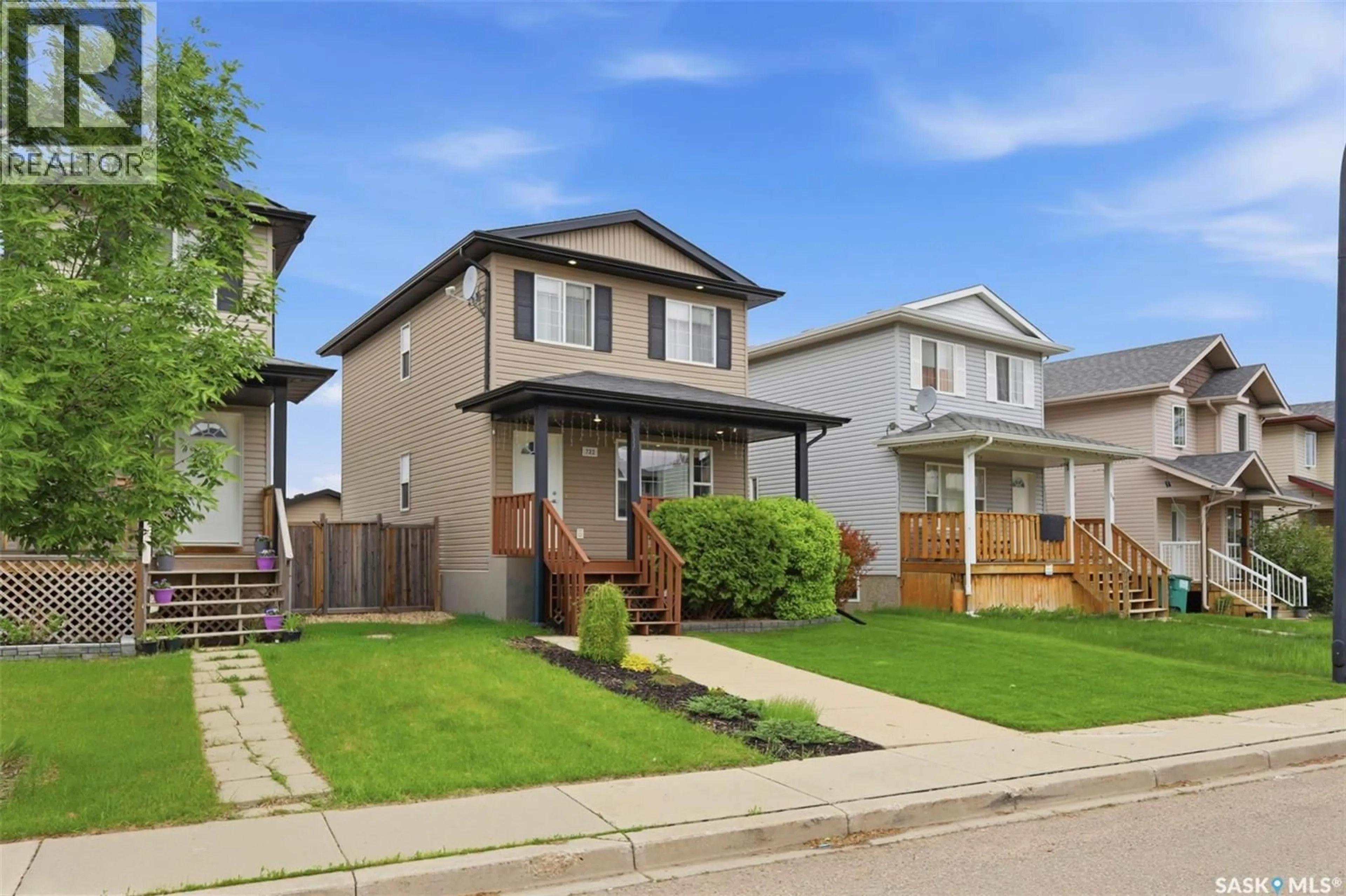 Home with vinyl exterior material, street for 722 LAMARSH LANE, Saskatoon Saskatchewan S7W1B6