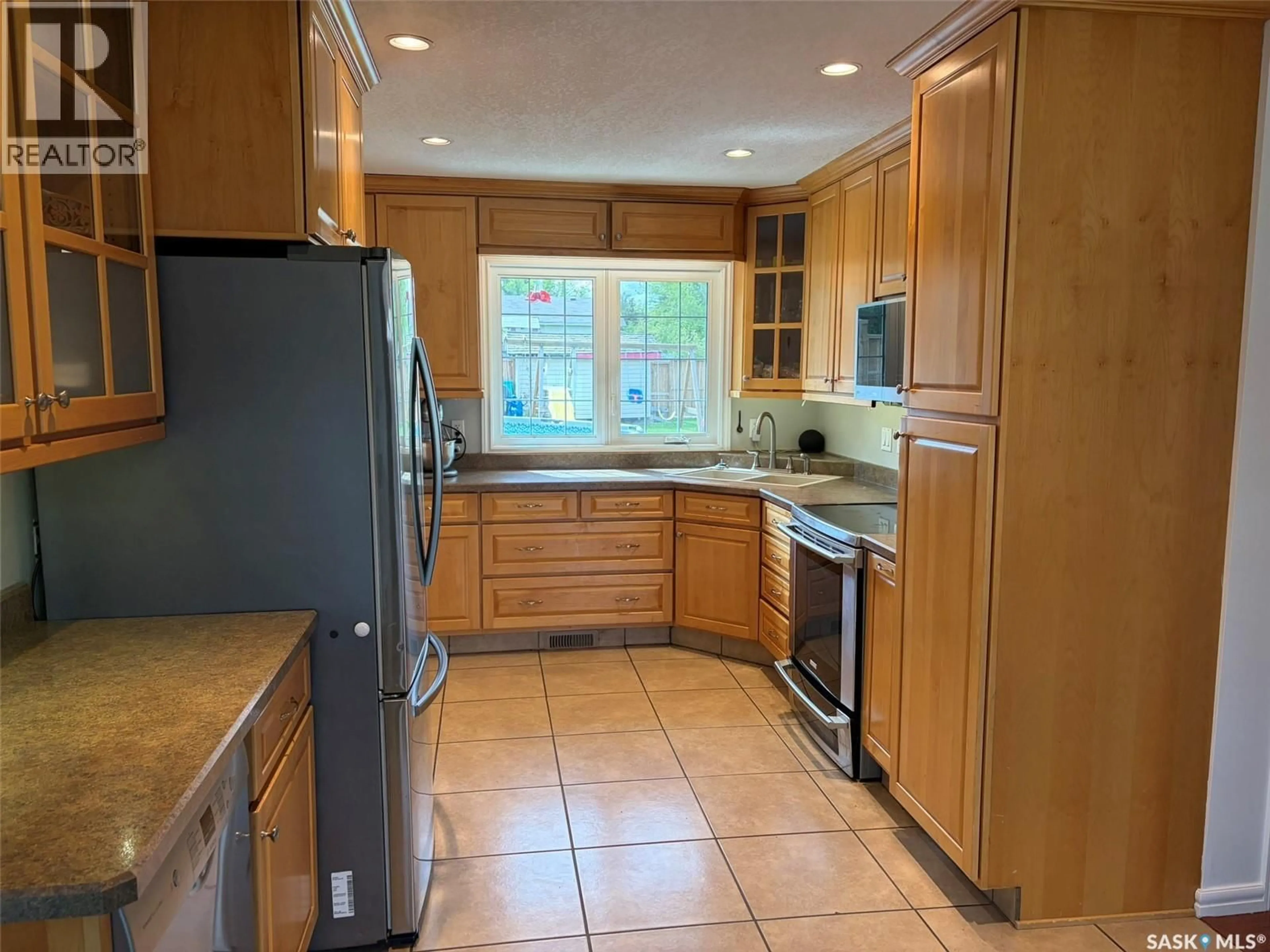 Standard kitchen, ceramic/tile floor for E - 105 5TH STREET, Birch Hills Saskatchewan S0J0G0