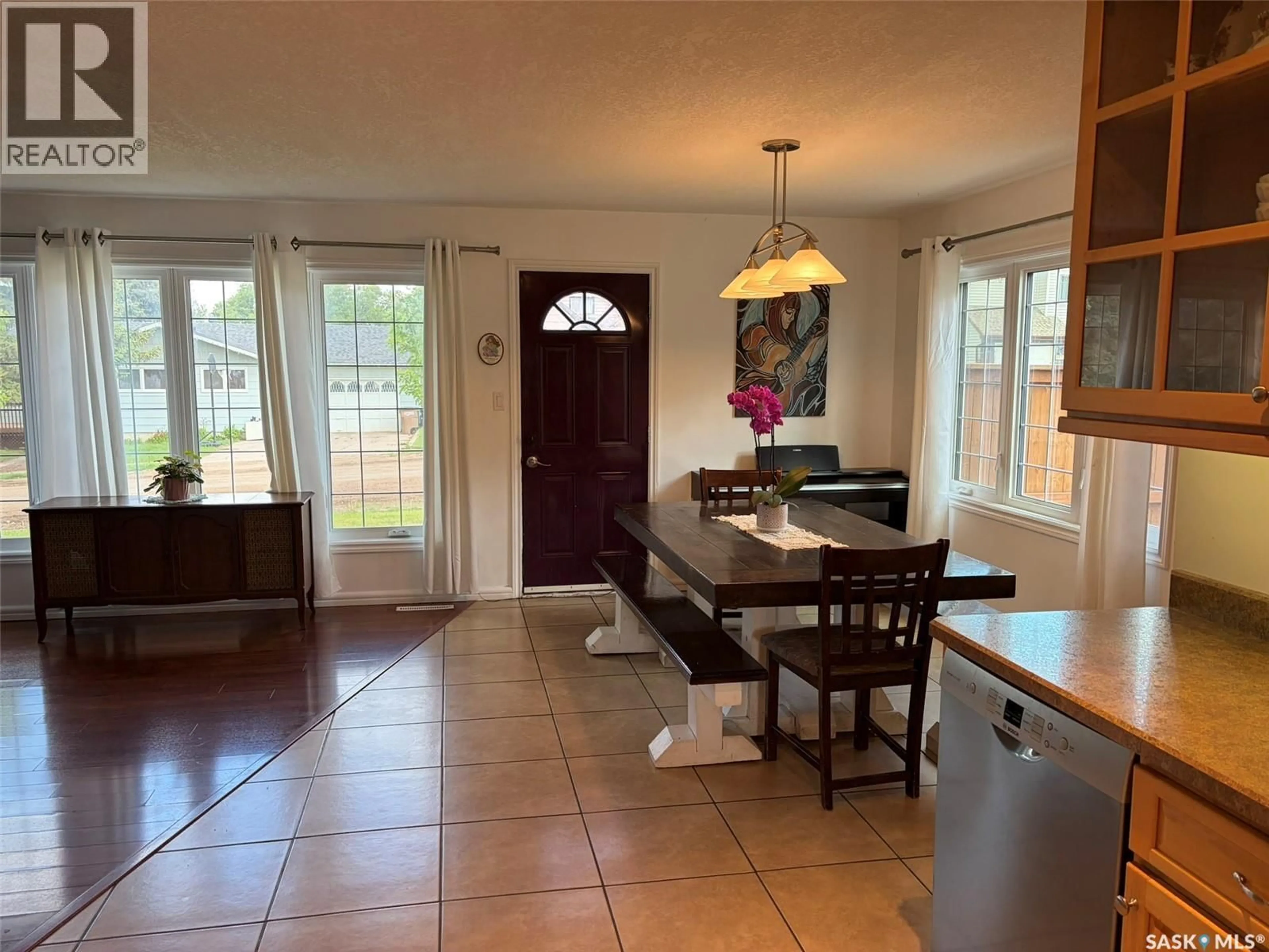 Open concept kitchen, ceramic/tile floor for E - 105 5TH STREET, Birch Hills Saskatchewan S0J0G0