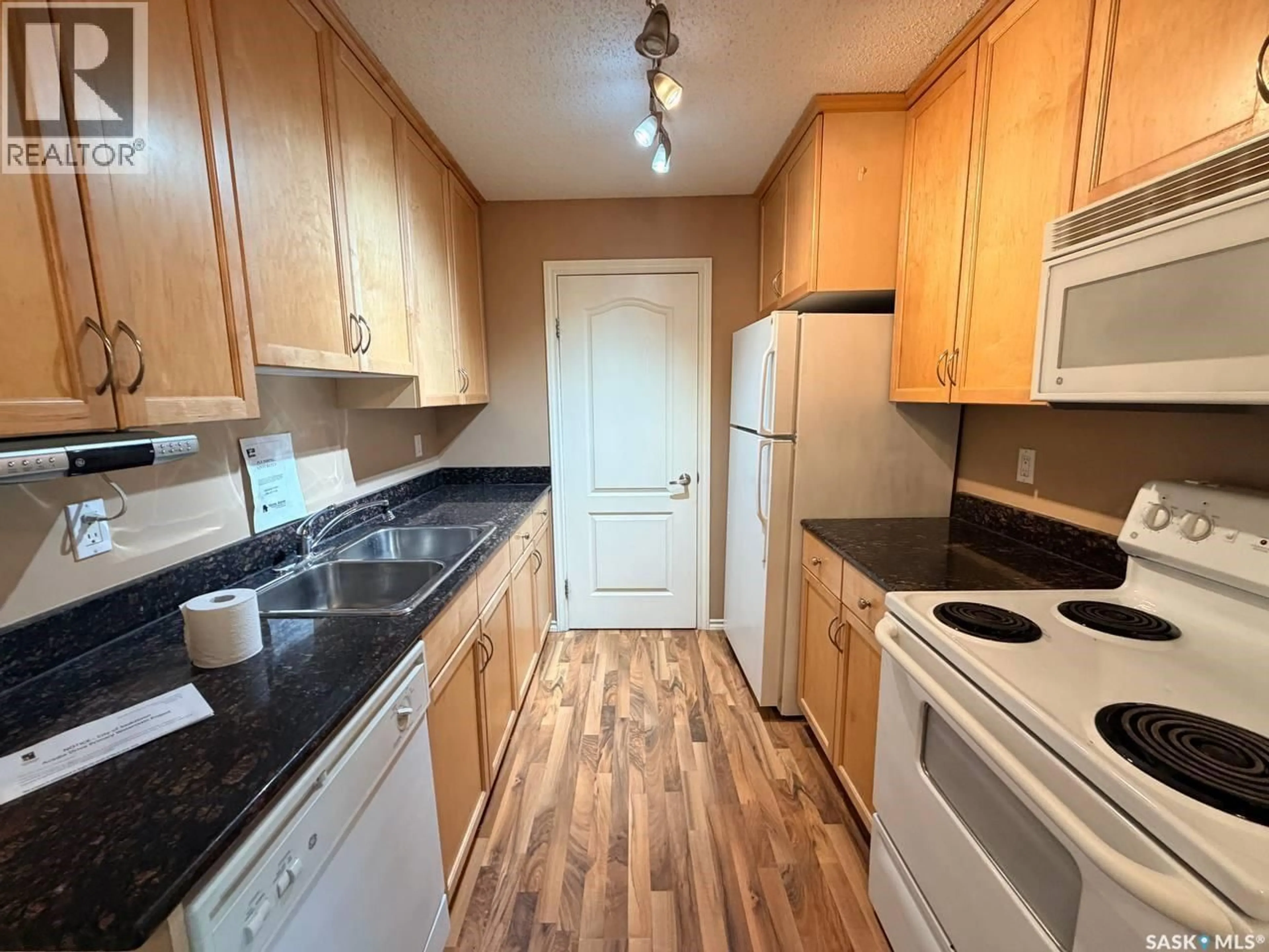 Standard kitchen, wood/laminate floor for A1 - 1121 MCKERCHER DRIVE, Saskatoon Saskatchewan S7H5B8