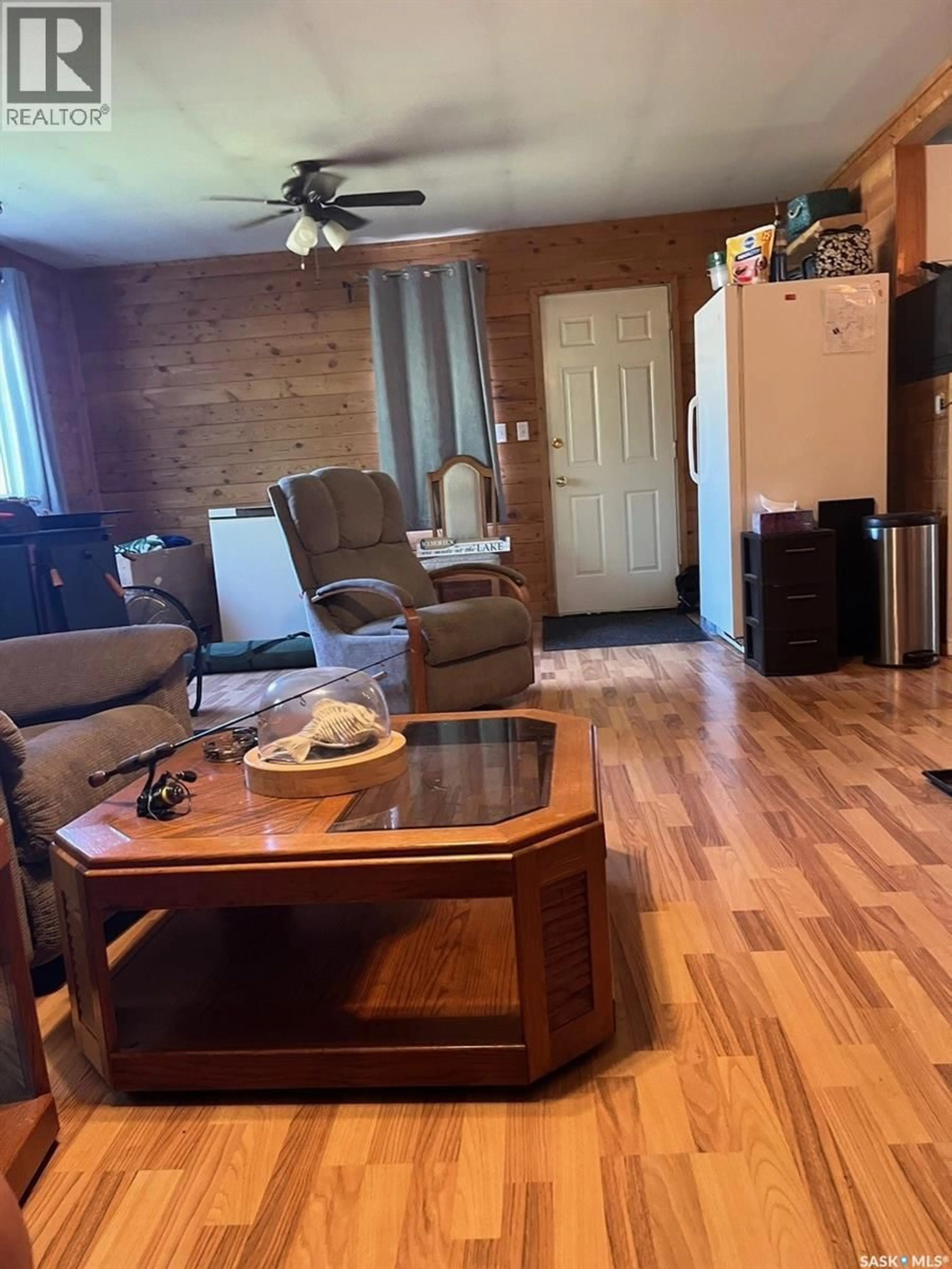 Living room with furniture, wood/laminate floor for 2 MIRASTY STREET, Sled Lake Saskatchewan S0J0B0