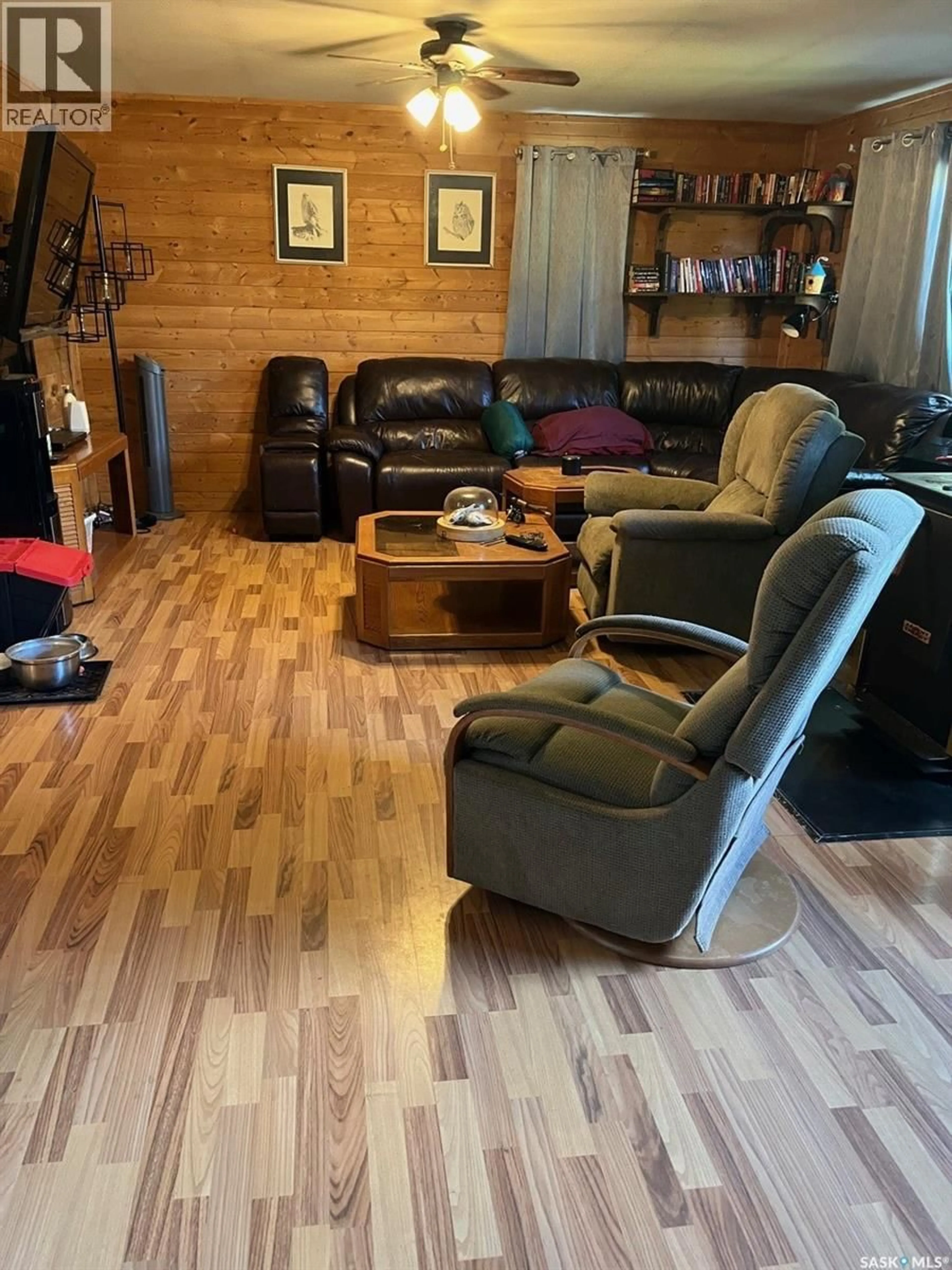 Living room with furniture, wood/laminate floor for 2 MIRASTY STREET, Sled Lake Saskatchewan S0J0B0