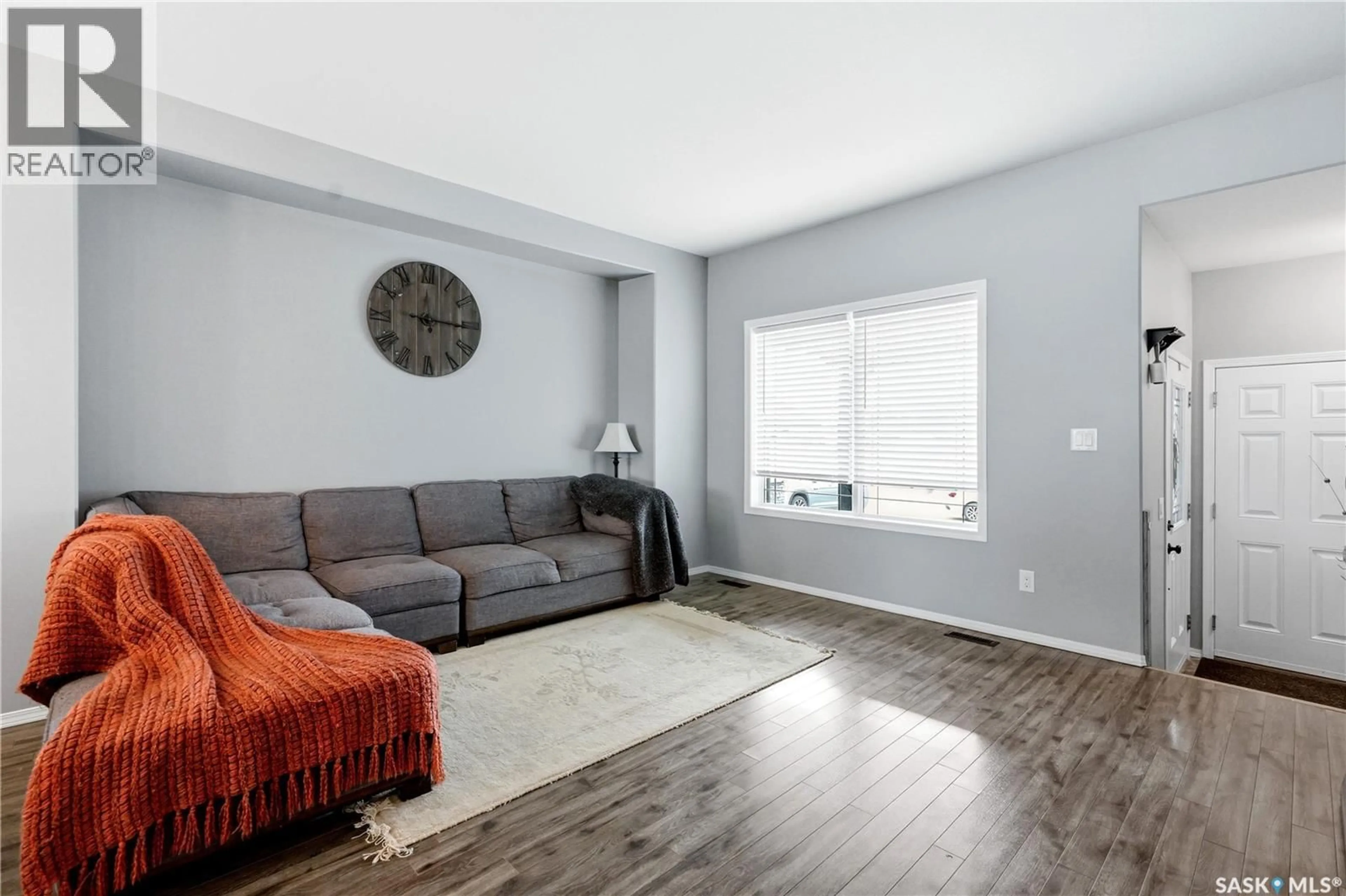 Living room with furniture, unknown for 705 GOWAN ROAD, Warman Saskatchewan S0K4S2