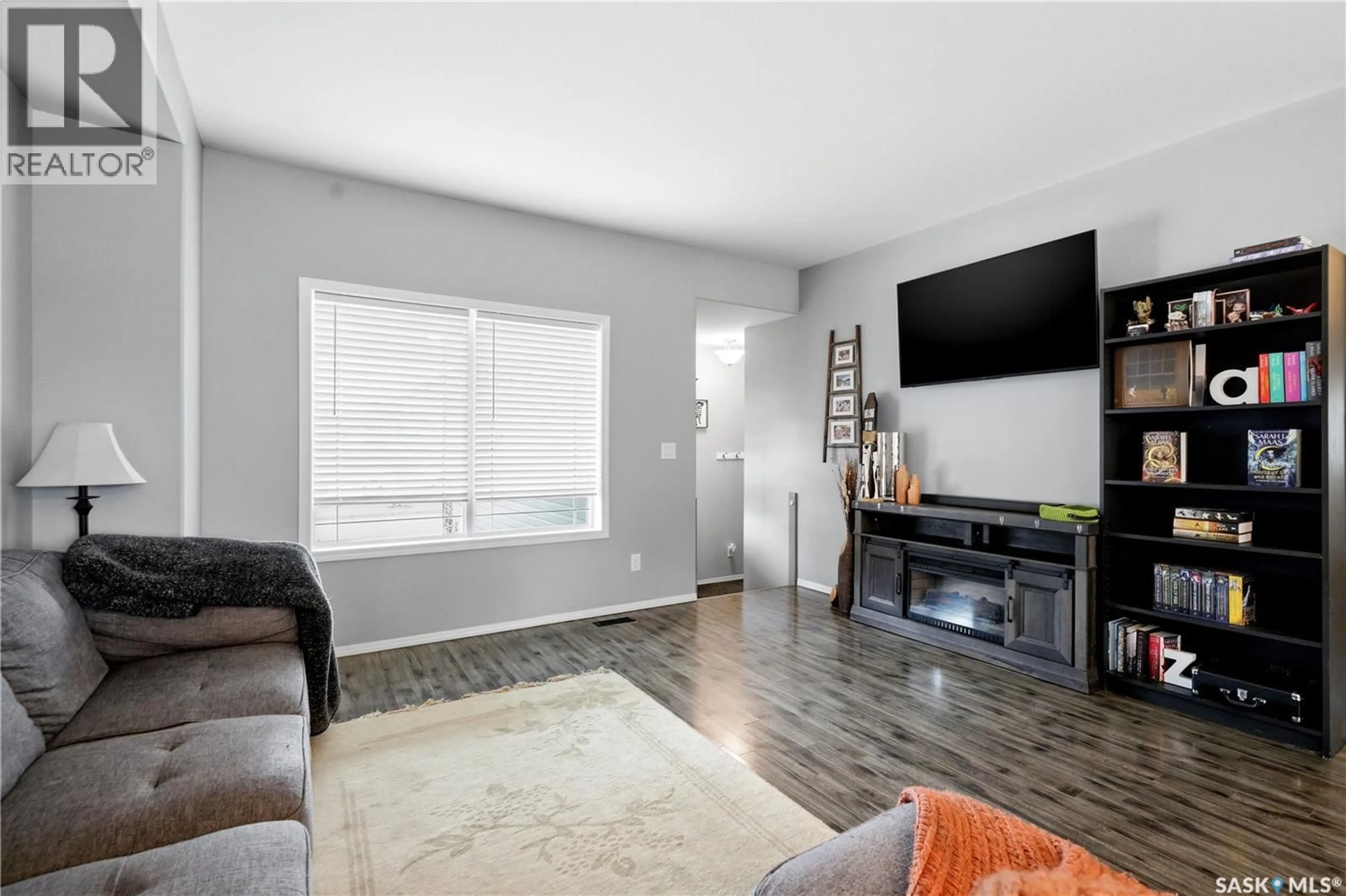 Living room with furniture, unknown for 705 GOWAN ROAD, Warman Saskatchewan S0K4S2