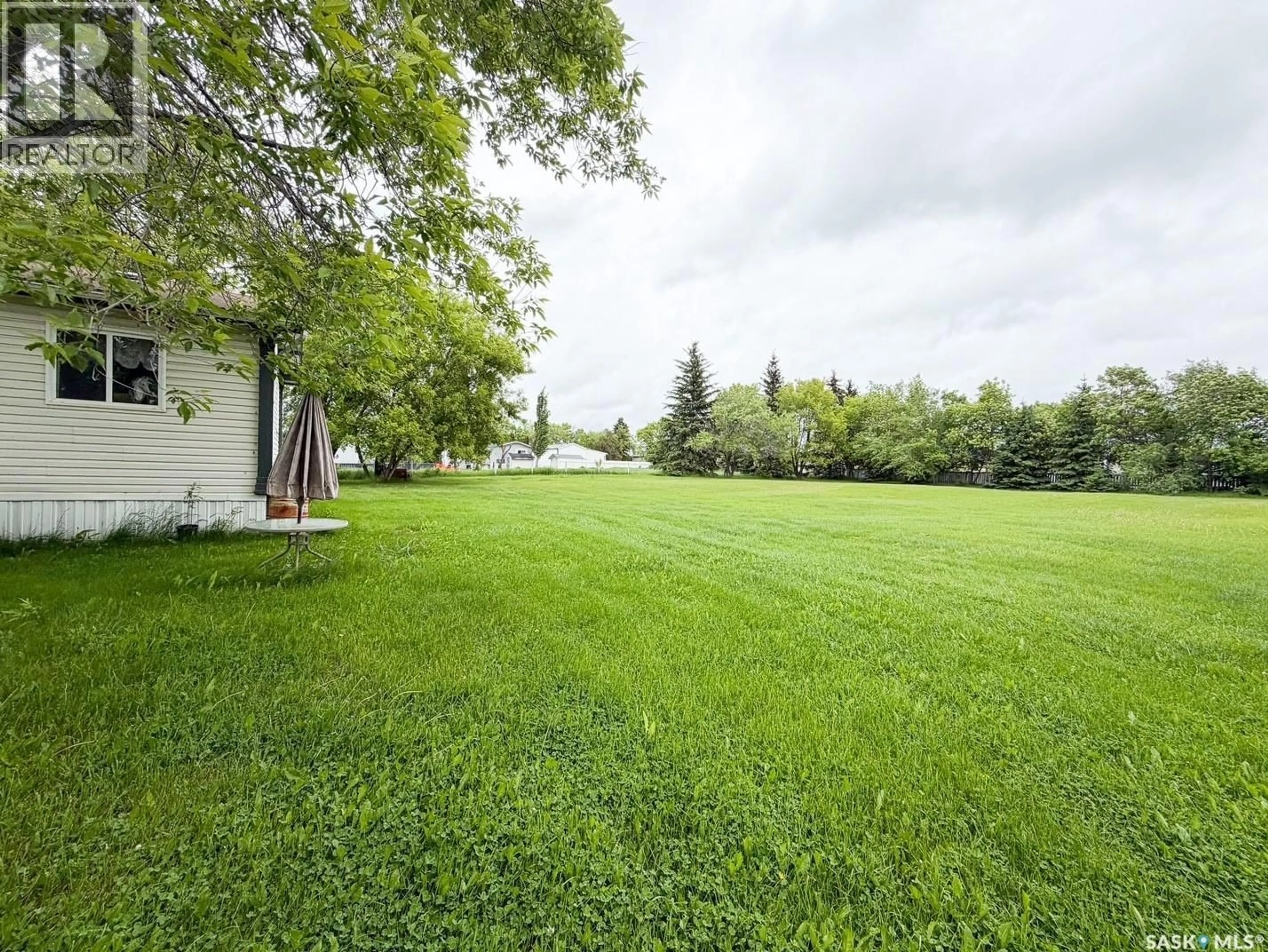 Patio, water/lake/river/ocean view for E - 501 7TH AVENUE, Meadow Lake Saskatchewan S9X1X9